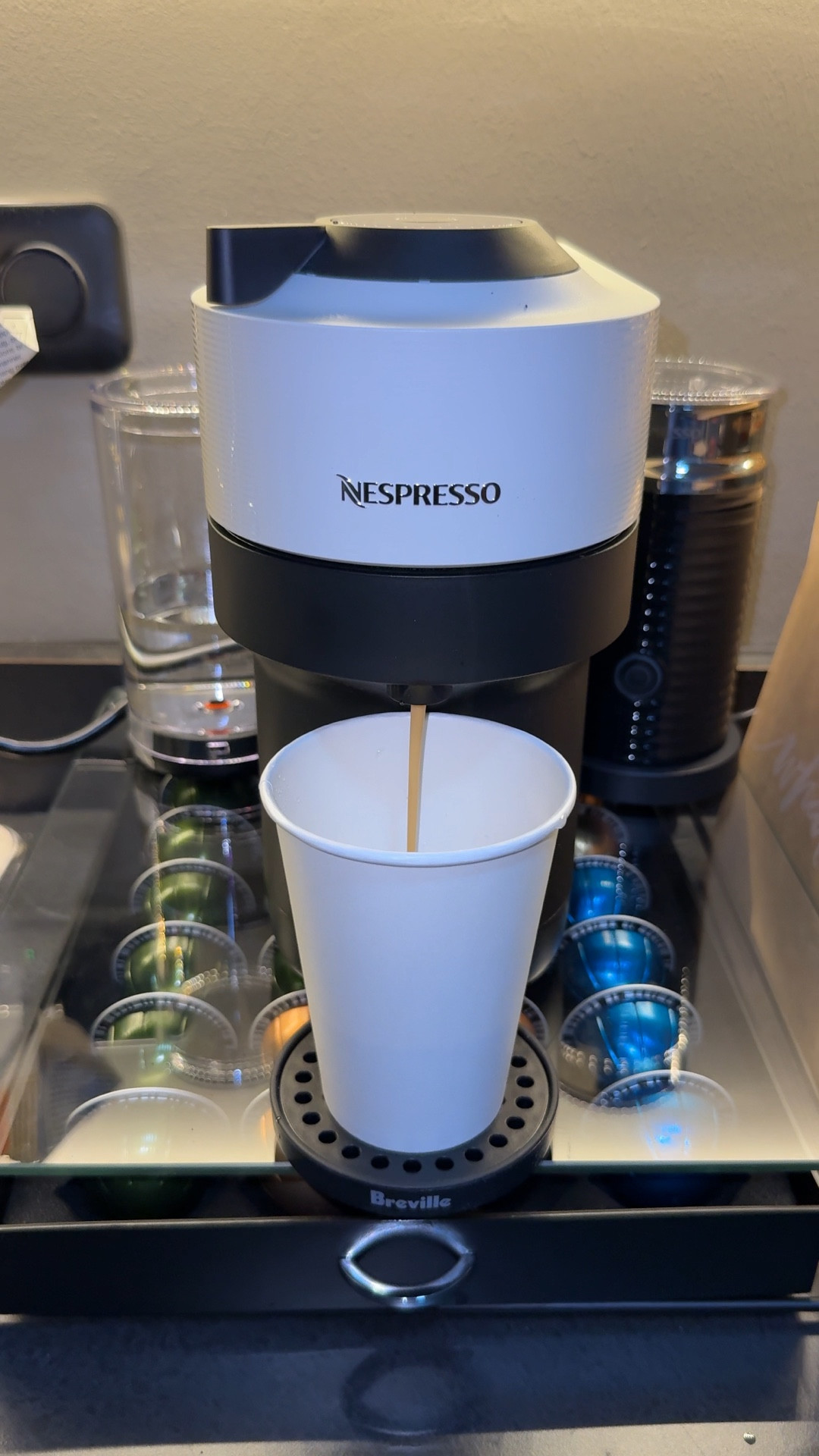 Absolutely obsessed with the Nespresso Vertuo Pop+ the coffee is strong and delish, the pour is quick. Easy to clean and the milk frother is a must for creamy lattes! The black Friday sale gets you the coffee maker, milk frother, and a good amount of coffee pods to get you started at a great price! 

#LTKCyberWeek #LTKHome #LTKFindsUnder100