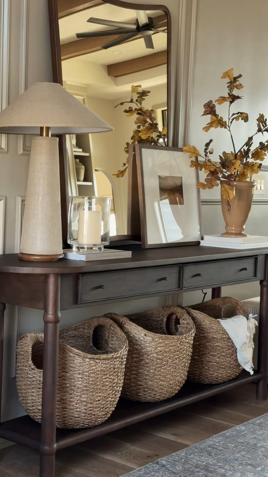 Not all wood tones are created equal—and this one is exactly right. 🤎 The warm, dark reclaimed wood contrasts beautifully with our mushroom-beige walls while complementing our medium-toned white oak floors, giving the entryway so much warmth and character.

I also love the rounded shape and traditional details—plus, the two drawers and lower shelf add extra storage without making the piece feel heavy.

I’ve linked the Amber Lewis x Four Hands console table along with all the other details in our entryway here.

#entryway #consoletable

#LTKHome