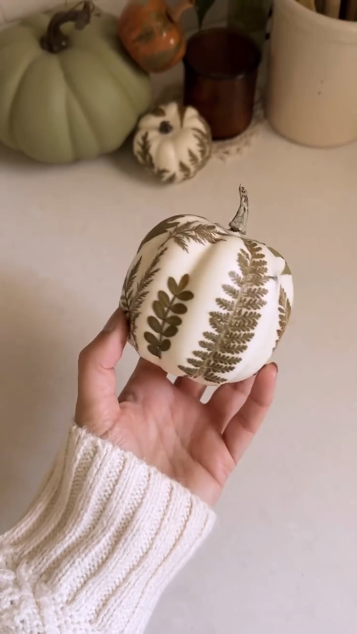 DIY Botanical Pumpkins🌿

A simple and easy craft for the girlies who hate pumpkin carving (aka me) 

What you’ll need:
• Mod Podge
• paint brushes
• Dried Leaves 
• Faux Pumpkins 

Paint a layer of mod podge on your pumpkin, place your faux leaves, then heavily coat overtop of your leaves with more mod podge to secure. Dry on a non-stick surface (I used wax paper). Optional: to get a super smooth finish you can spray your dried pumpkins with a clear top coat spray paint.

Who’s in fall craft mode?? 🙋‍♀️

#falldiy #pumpkindecor #fallcrafts #easyfalldecor #cottagecorefall #cottagecoreaesthetic