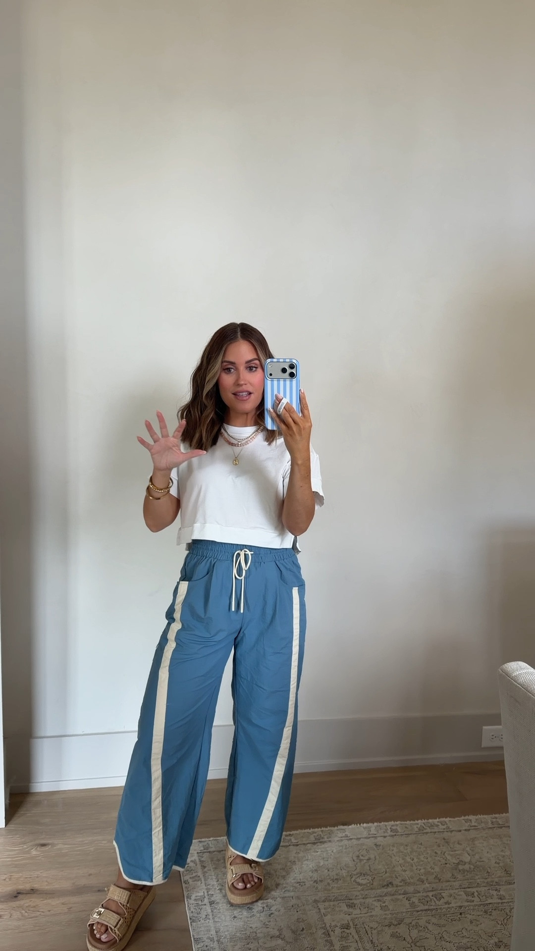 Wearing a small in these $25 track pants — come in lots of colors! Paired with an old white tee, but will link similar. Sandals run tts! 

*currently 17 weeks pregnant 

Casual style, track pants, barrel pants, bump friendly, white tee 

 

#LTKSaleAlert #LTKootd #LTKBump