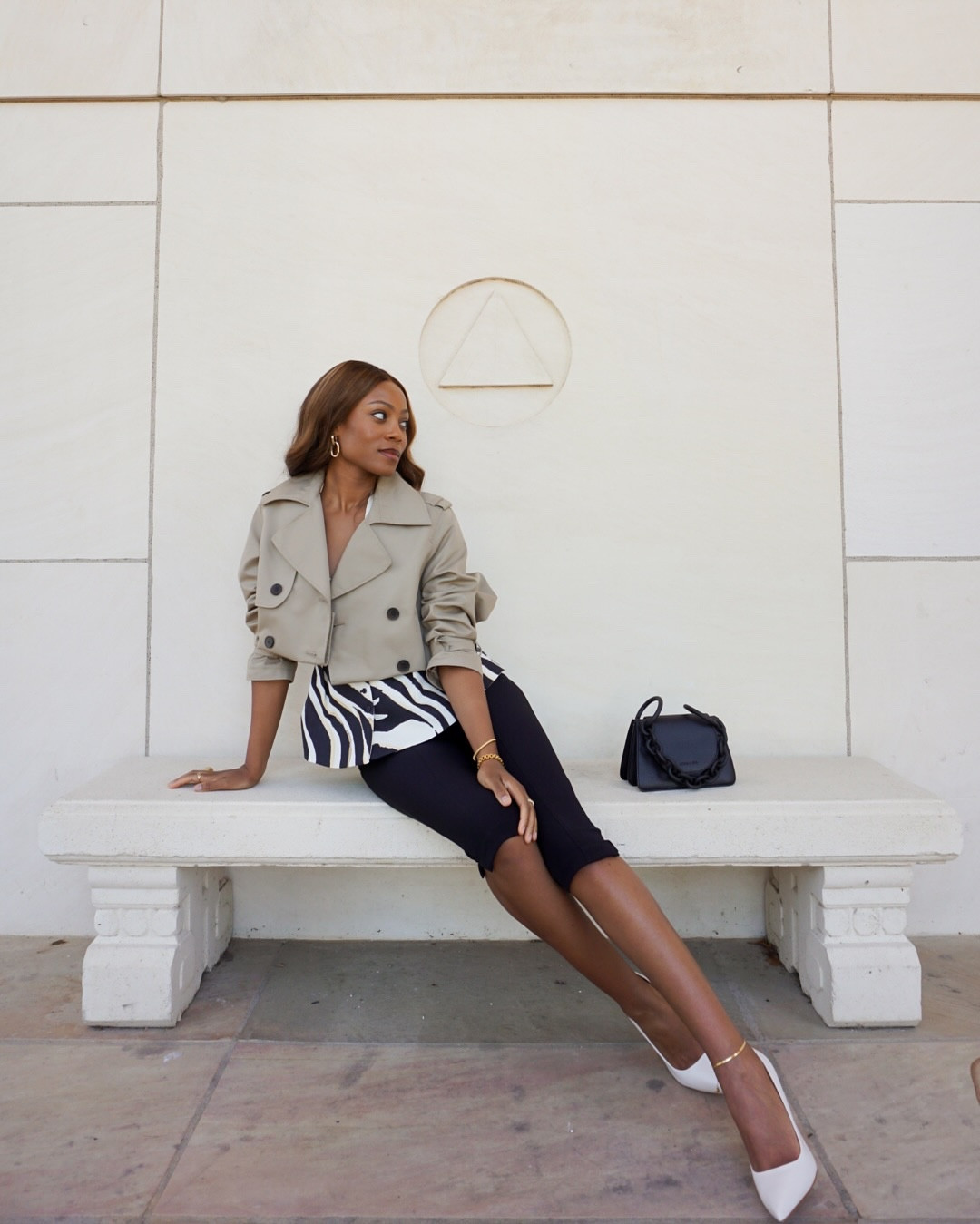 HOW TO MAKE NEUTRALS FUN AGAIN: 

LAYERING - One of my favorite ways to add interest to my outfits is with layering. A cute peplum top peeking out of a cropped trench jacket?! I love to see it 😍

SILHOUETTES - Make neutrals more fun with exciting silhouettes. Peplum top + crop trench coat + capri pants. These silhouettes make neutrals feel modern and fun. 

PRINTS - Prints like zebra print, cow print, or snake prints are interesting but still lean towards that neutral color palette. 

METALS - Bringing in metallics & metal with your jewelry & accessories. This will take your style to the next level. Gold anklet, gold heels, gold rings, gold earrings — they all add some spunk to the fit and make you want to give a second look. 😉

Top @mango 
Pants @hm 
Jacket @hm 
Heels @schutz 
Bag @charleskeithofficial 

How are you making neutrals fun?? 

Comment outfit for a direct link to shop this fit 😍

#Styleadvice #stylist #styled
#howtostyle #ootd #grwm #grwmoutfit #grwmvideo #styleinspo #styleinspiration #styleblogger #style #styleoftheday #styleover40 #styleover30 #styleblog #outfitinspiration #dallasinfluencer #dallasstyle #dallasstylist #dallascontentcreator #dallasfashionblogger