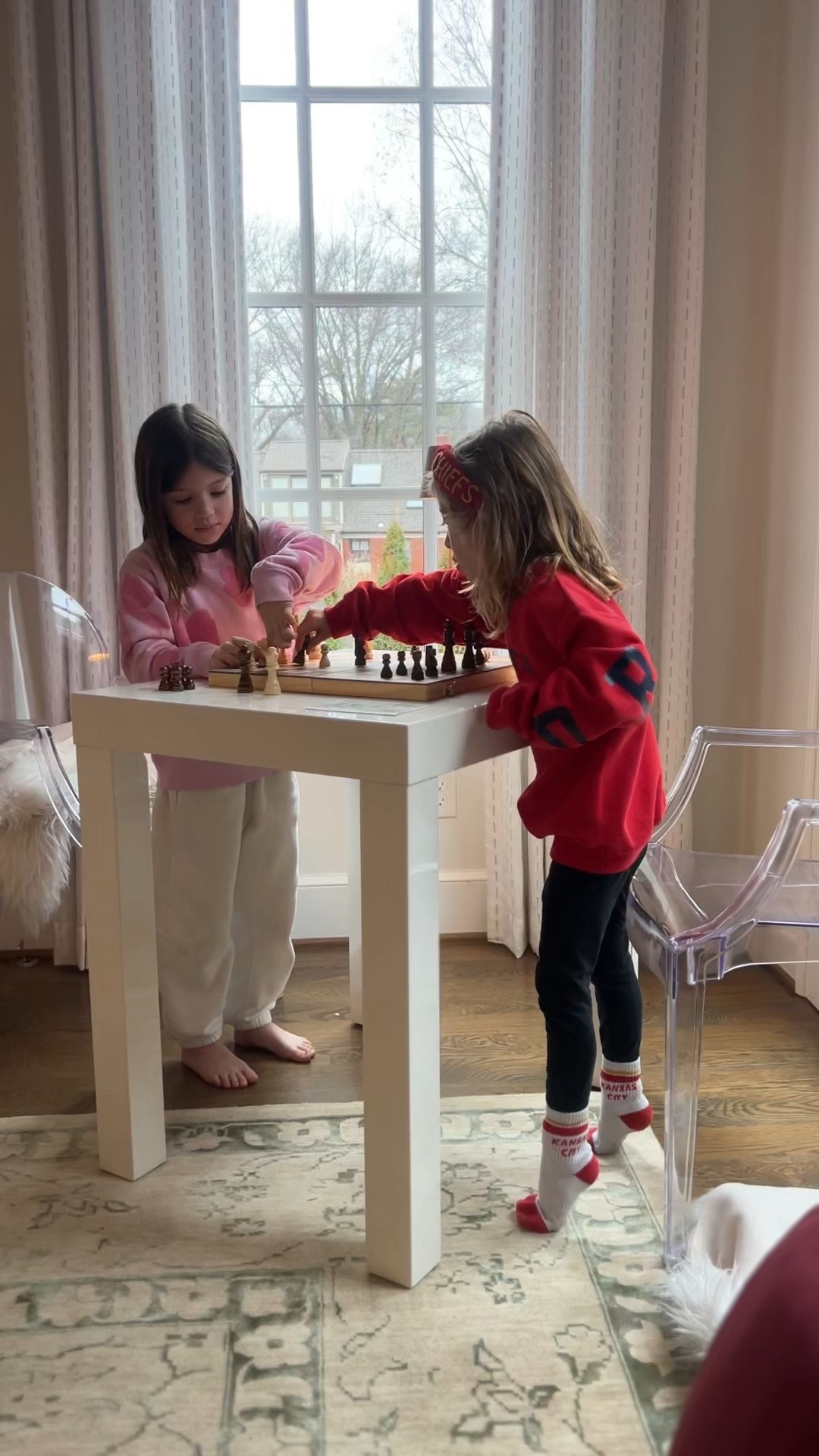 OBSESSED with this new little corner in our living room! We got this magnetic chess board game and the girls are playing all the time. We are still searching for a true game table but right now this ikea desk is perfect 🤩 this magnetic chess board is perfect for  kids learning too :) 

#LTKKids #LTKHome #LTKSaleAlert