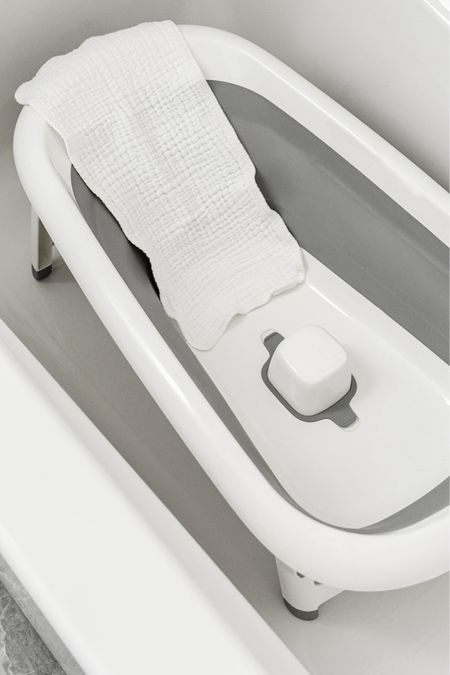 I pulled out our infant bathtub today to make sure it’s all ready for baby’s (eventual) first bath and I had forgotten how much we love this bathtub! It collapses to being nearly completely flat (excellent for storage and easy to remove so that our toddler can take her baths in the actual tub), has an easy-empty drain in the bottom, and you can put baby on the other side once they’re able to sit up on their own so it kind of "grows with them”. Highly recommend if you’re in the market for an infant bathtub! 🫧🛁

#LTKbaby
