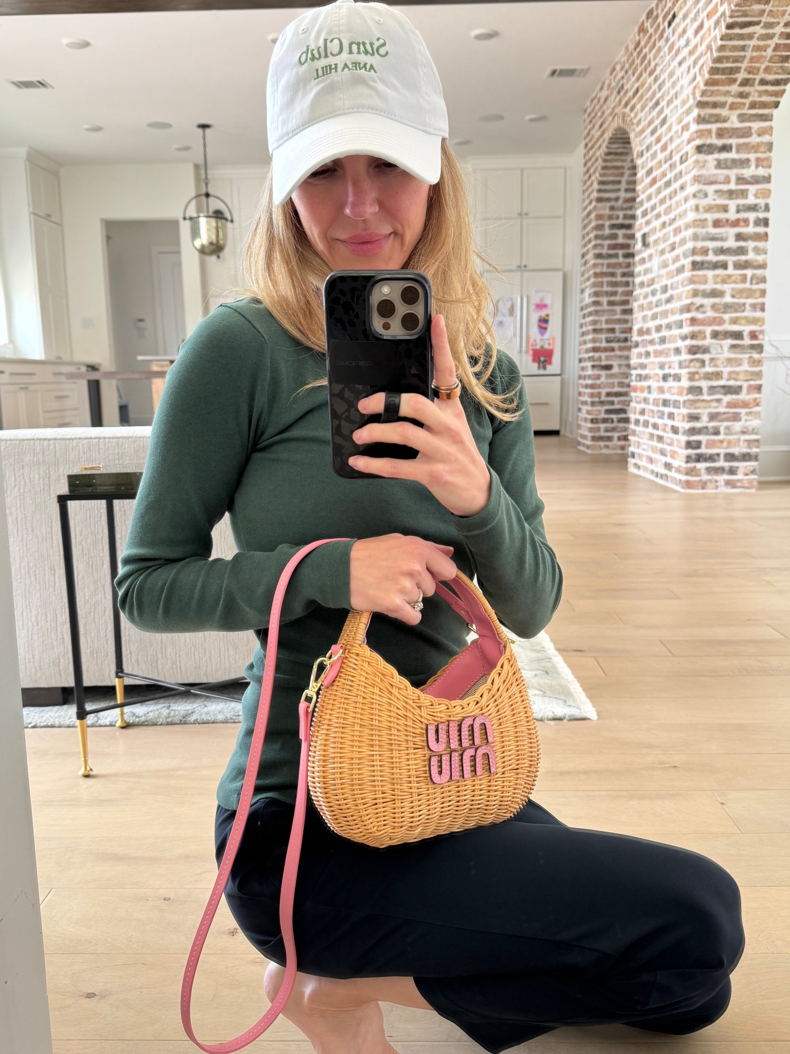 There is something so lovely about getting dressed, even for the car line. Today it feels like the perfect balance of comfort and polish.

A fitted green top, navy Vuori pants that are coming soon, and my ANEA HILL Sun Club hat. Simple pieces, yet when worn together they feel thoughtful.

And then my favorite accessory, a vintage MIU MIU bag, with the newest version linked for you. It is a little detail, but it always makes me smile.

I cannot wait to see the girls and hear every story from their day. It is these small in between moments that feel like the most beautiful parts of life.

⸻

#aneahill #vuoripants #miumiu #miumiubag #schoolpickupstyle #quietluxuryfashion #sunclubhat #momstyleinspo #carlinecouture #everydayelevated #falloutfitideas #momlifechic #sustainableluxury #chicandcasual