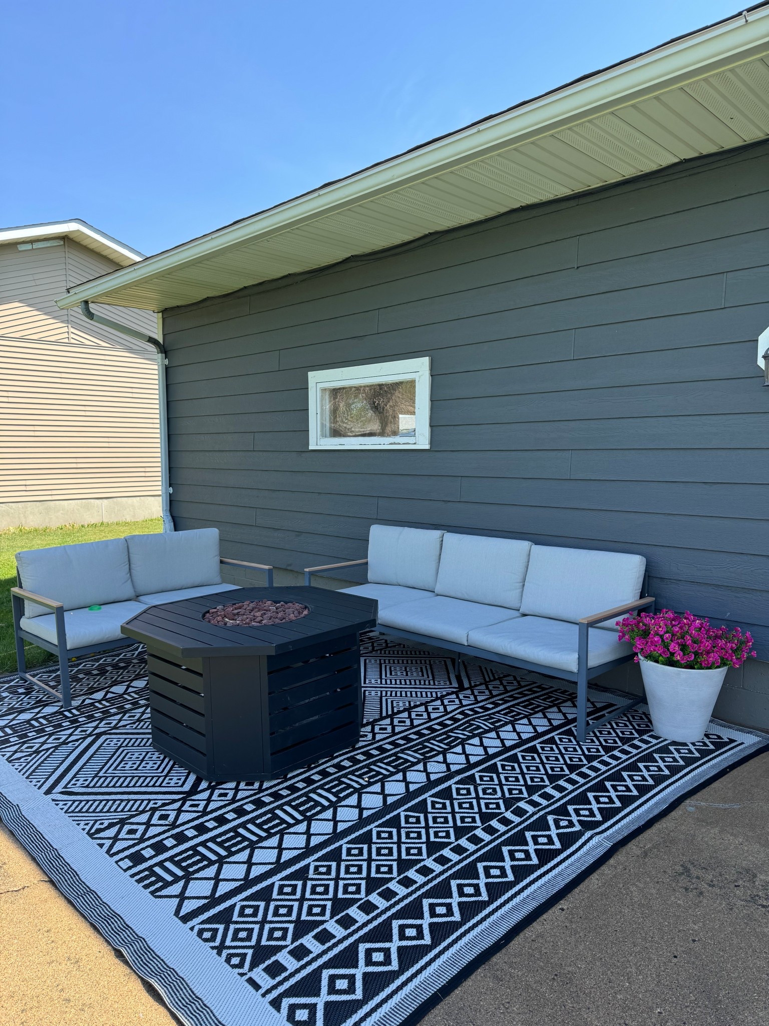 Outdoor patio set up so far - umbrella coming! Most out of stock sadly but linking still and some similar!:) 

#patiofurniture #outdoorrug #firepit #fakeflowers

#LTKHome #LTKSeasonal