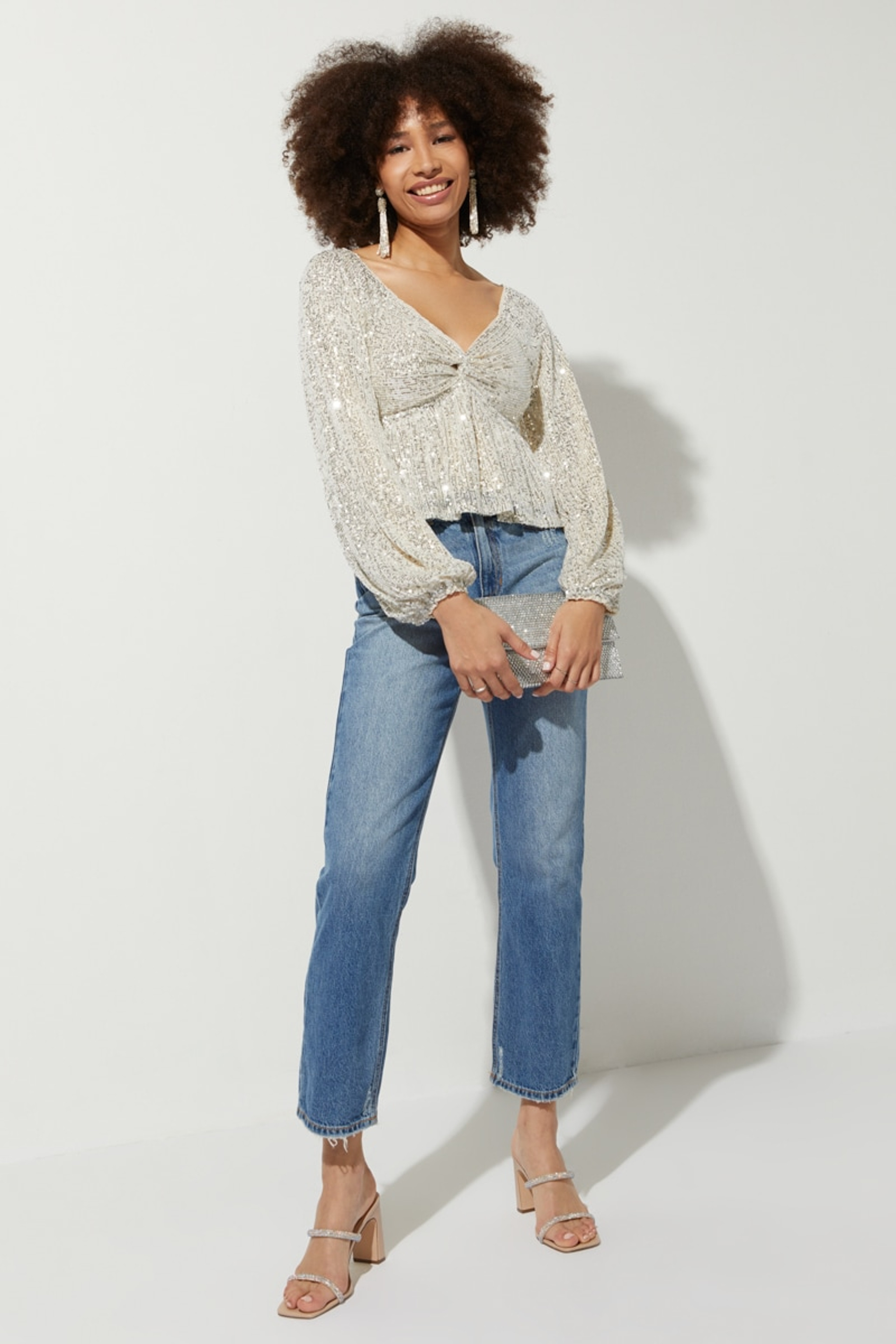 Nicolette Sequin Front Twist Blouse | Francesca's