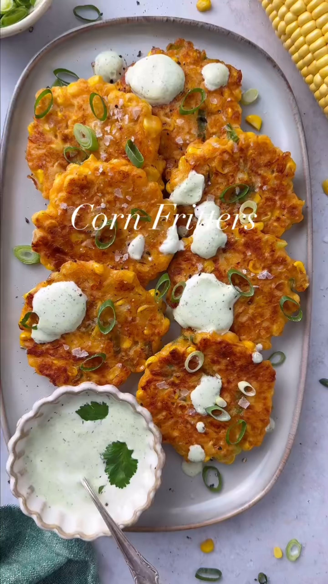 
Golden, crispy Corn Fritters bursting with sweet corn, sharp cheddar, fresh green onions, and perfectly spiced with smoky and savory flavors. Easy to make and incredibly versatile, they’re ideal as an appetizer, side dish, or light meal. Pair them with your favorite dip for a satisfying bite that’s sure to become a favorite! Full recipe here: https://www.twopeasandtheirpod.com/corn-fritters/

#LTKHome #LTKFindsUnder50 #LTKSeasonal