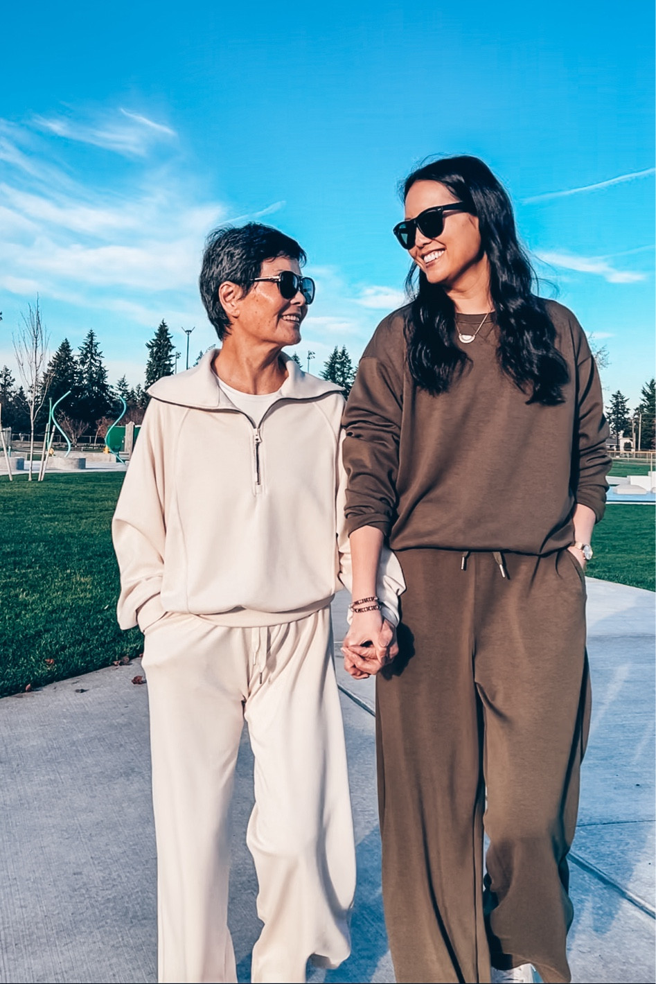 Suuksess matching sets, loungewear, sweat sets, wide leg pants set, half zip sweatshirt, crewneck sweatshirt, modal.
I’m wearing size large, but medium fit great too.  I just like a little extra length since I’m 5’9”.
My mom is wearing size medium.  She is 5’2” so she had to roll the waistband twice.  
Double lined long sleeve tshirt, size up one or two