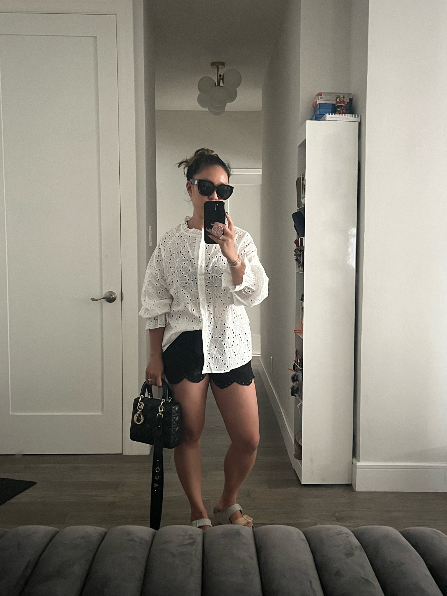 Eyelet top. White shirt. Lots of fabric in the sleeve. Easily fixable. I’m wearing an xs.

#LTKTravel #LTKFindsUnder50 #LTKItBag