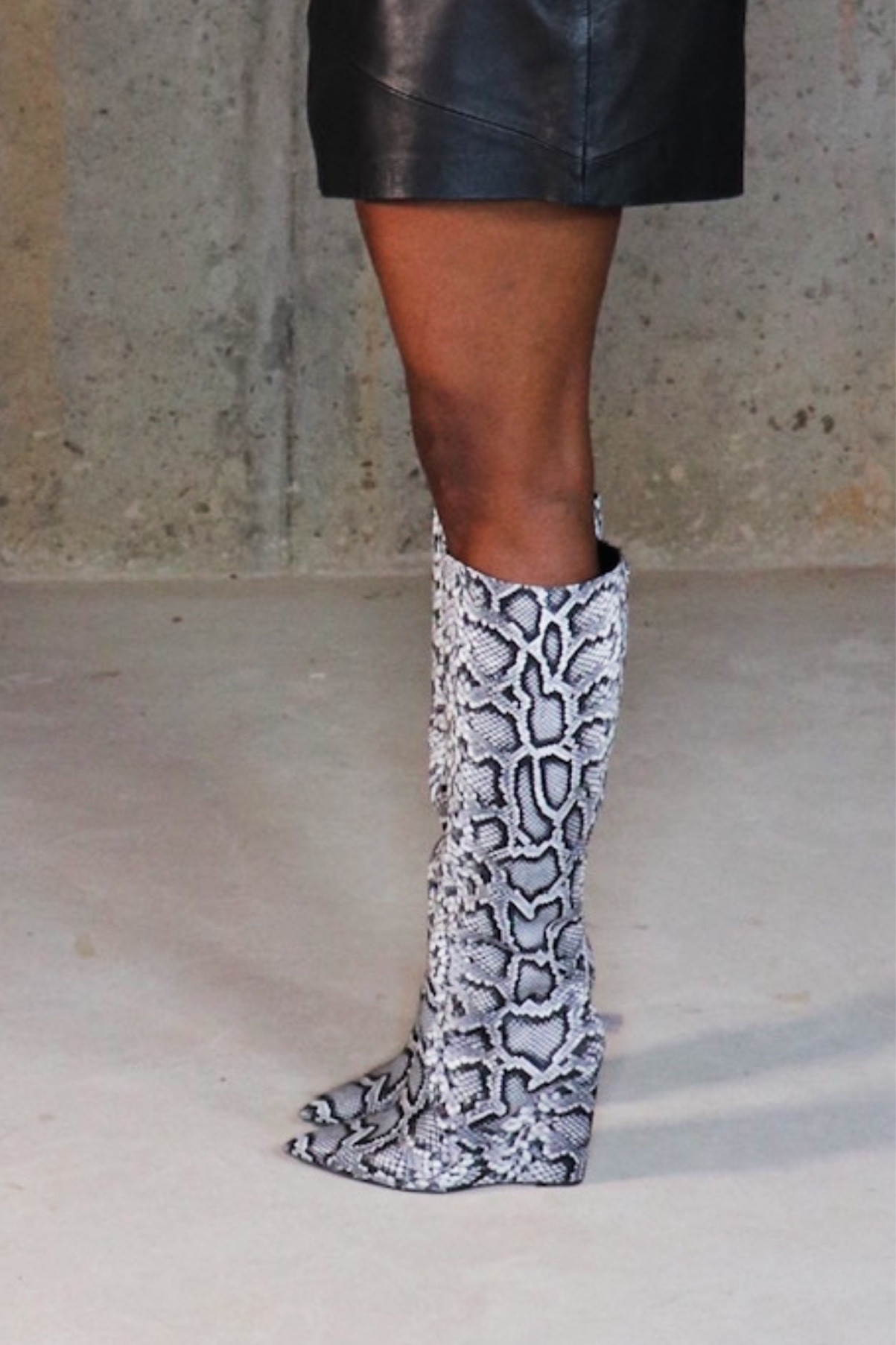 Black Skirts & Snakeskin Boots are an undefeated pair of friends. 🖤

#LTKstyletip #LTKshoecrush