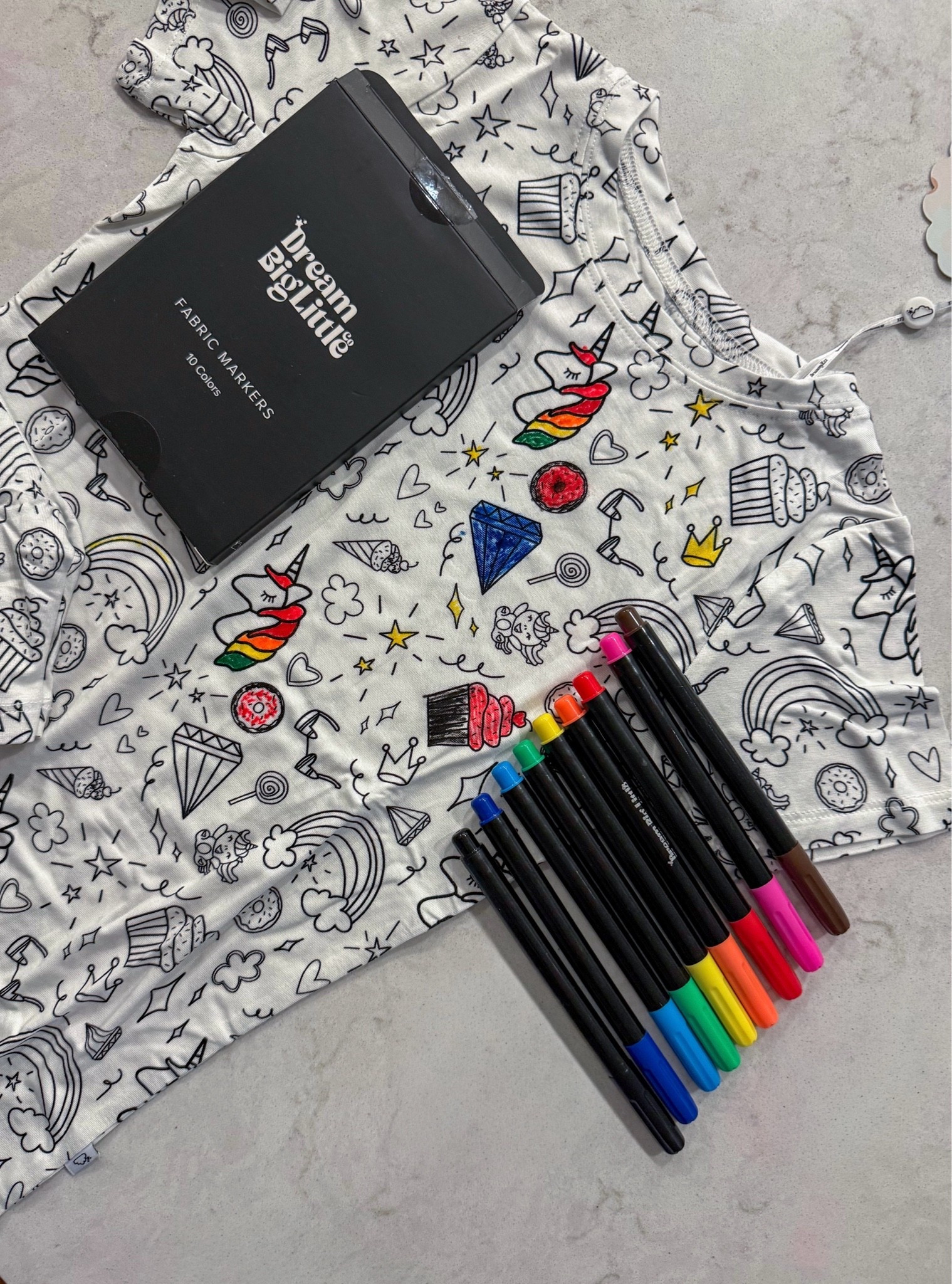 The cutest little activity tee 🌈✨🦄

Color it, wear it, wash it & do it all over again 🎨 We had way too much fun bringing all the little doodles to life & I LOVE that it’s an activity and an outfit in one. Such a cute idea for travel days, restaurants, quiet time or a fun little gift. 💕

Linked the tee + markers on my LTK!
#LTKkids #KidsActivities #ColoringShirt #MomFinds #GiftIdeasForKids #CreativeKids

#LTKdayinmylife #LTKmomlife #LTKootd
