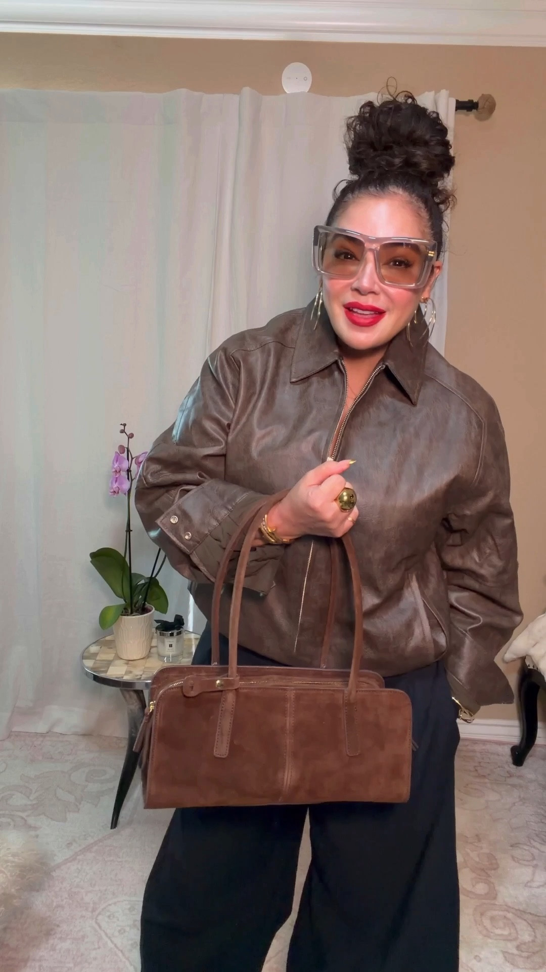 LA finally gave us a chilly day and I could not be happier…because it means I get to wear this incredible bomber jacket!

It looks and feels like a million bucks and it’s one of those timeless staples every closet needs. I paired it with a cozy tank, balloon pants, Gucci platform loafers, a spectacular suede bag, and epic gold jewelry.

Finished the look with the perfect fragrance (smells divine), a red lip, and my signature messy bun…and just like that I’m ready to take on the day.

Wear something today that makes you feel confident, polished, and a little unstoppable. Everything’s linked for you in LTK.

#Over50andFabulous #MidlifeStyle #Over50Style #StyleOver50

#LTKOver40 #LTKgrwm #LTKootd