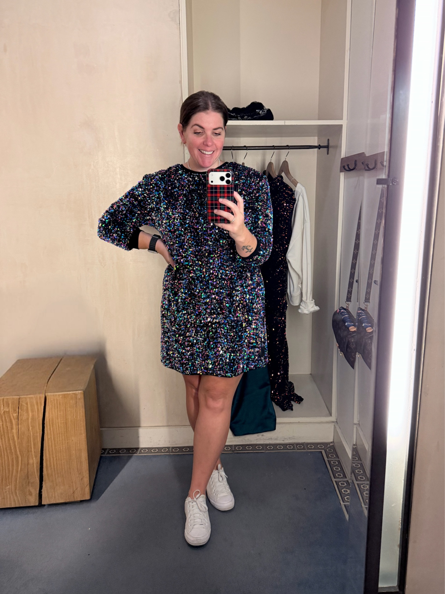 This sequin sweatshirt dress is a 10/10! I love the fit of the dress and the colors the sequins make are amazing! This dress can be dressed up or down for any holiday event! It’s from Anthropologie and runs TTS! 

#LTKHoliday #LTKSeasonal #LTKOver40