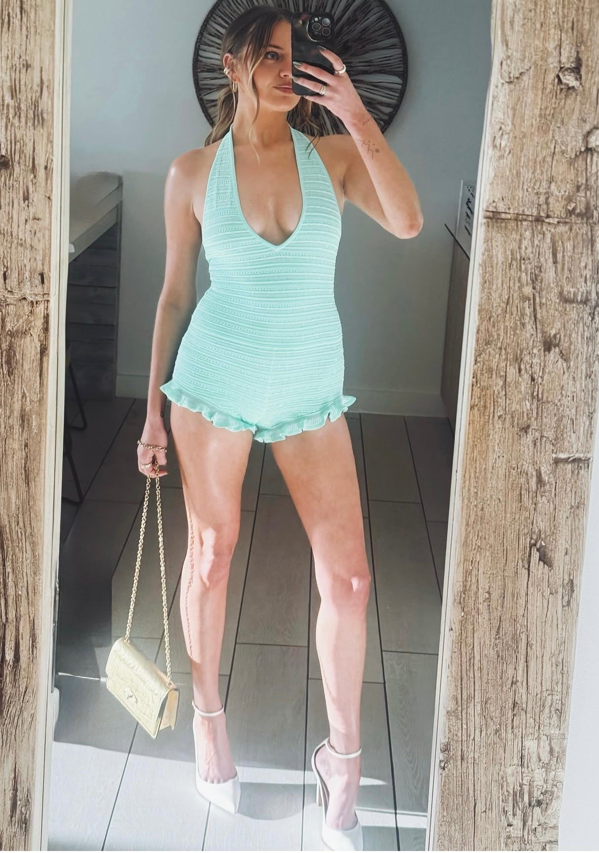 Kelsea Ballerini is Summer ready in this cute halter neck knit romper  ￼