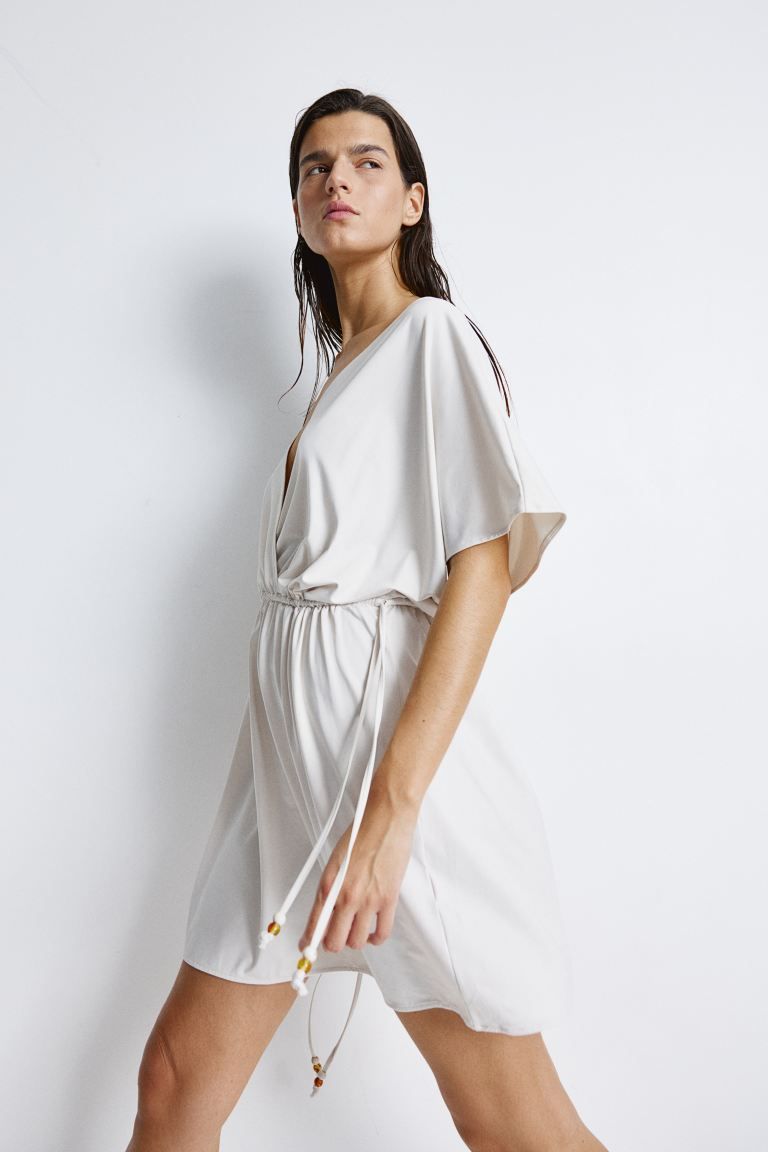 V-neck Beach Dress - Low-cut Neckline - Short sleeve - Pale beige - Ladies | H&M US | H&M (US + CA)
