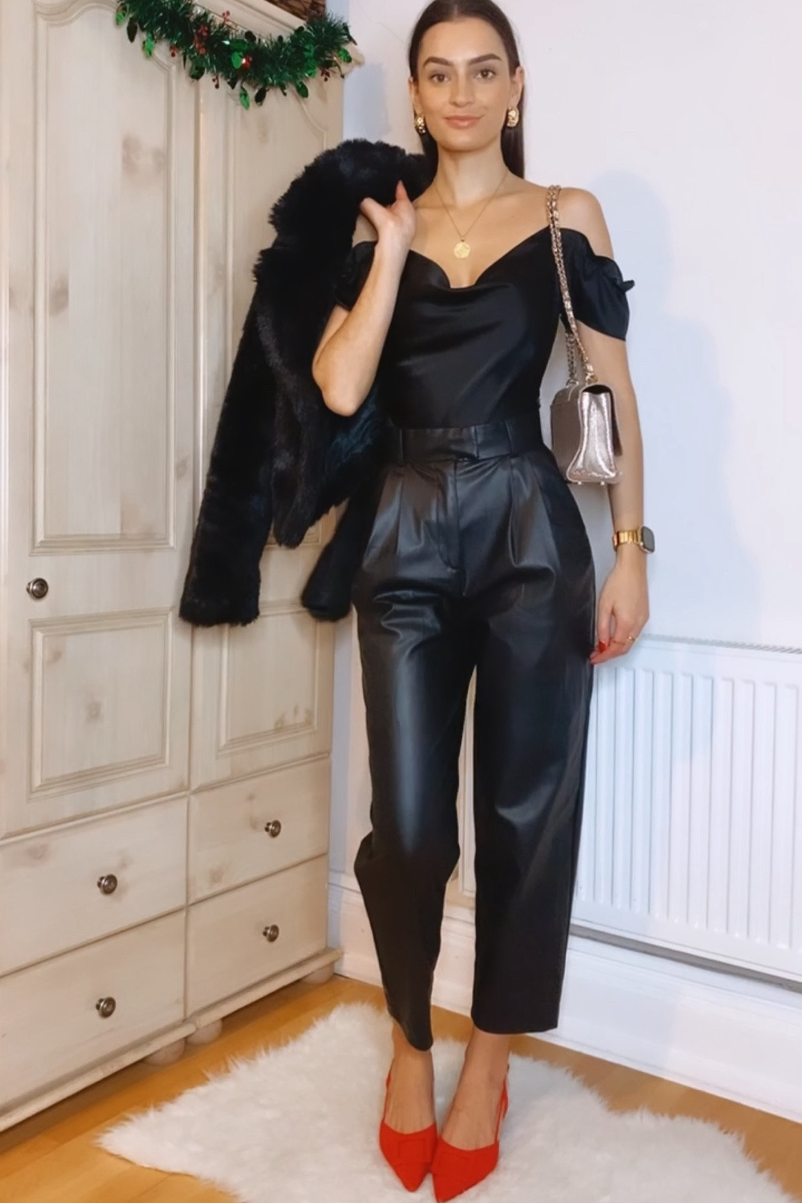 7 Days, 7 Party Looks: Day 6
Black faux fur coat, black bodysuit, faux leather trousers, red shoes, glitter bag 

#LTKHoliday