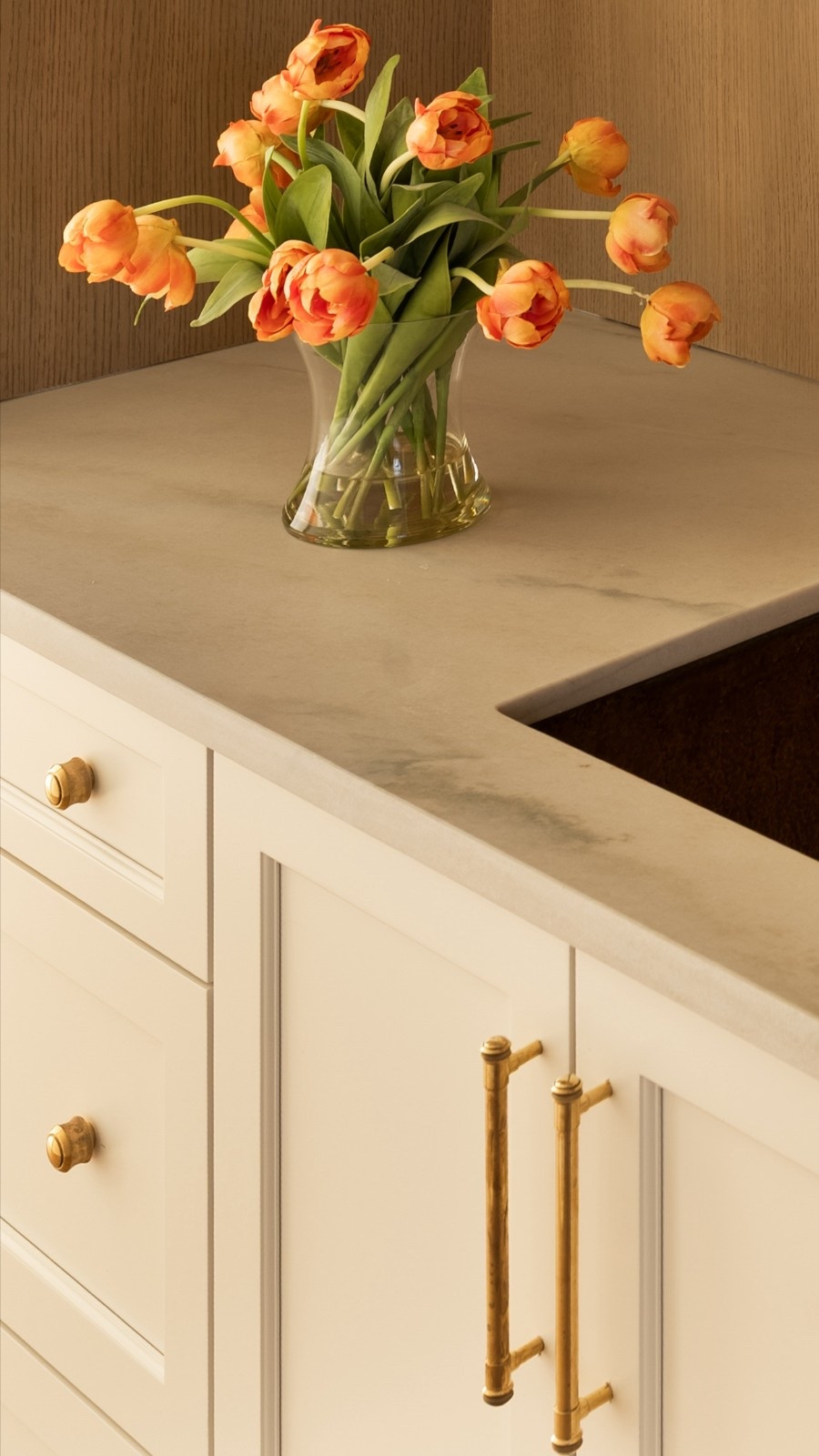 In the Butler’s pantry, we used the same cabinet materials as the main kitchen along with the countertops to add a little variety and to differentiate the space rather than going with polished nickel hardware like we did in the kitchen in the Butler’s pantry we went for a warmer color using unlacquered brass for the hardware. The detail on this rejuvenation knobs and handles is so well done and when the unlacquered brass between us, it’s only gonna look better and better! 

#LTKHome