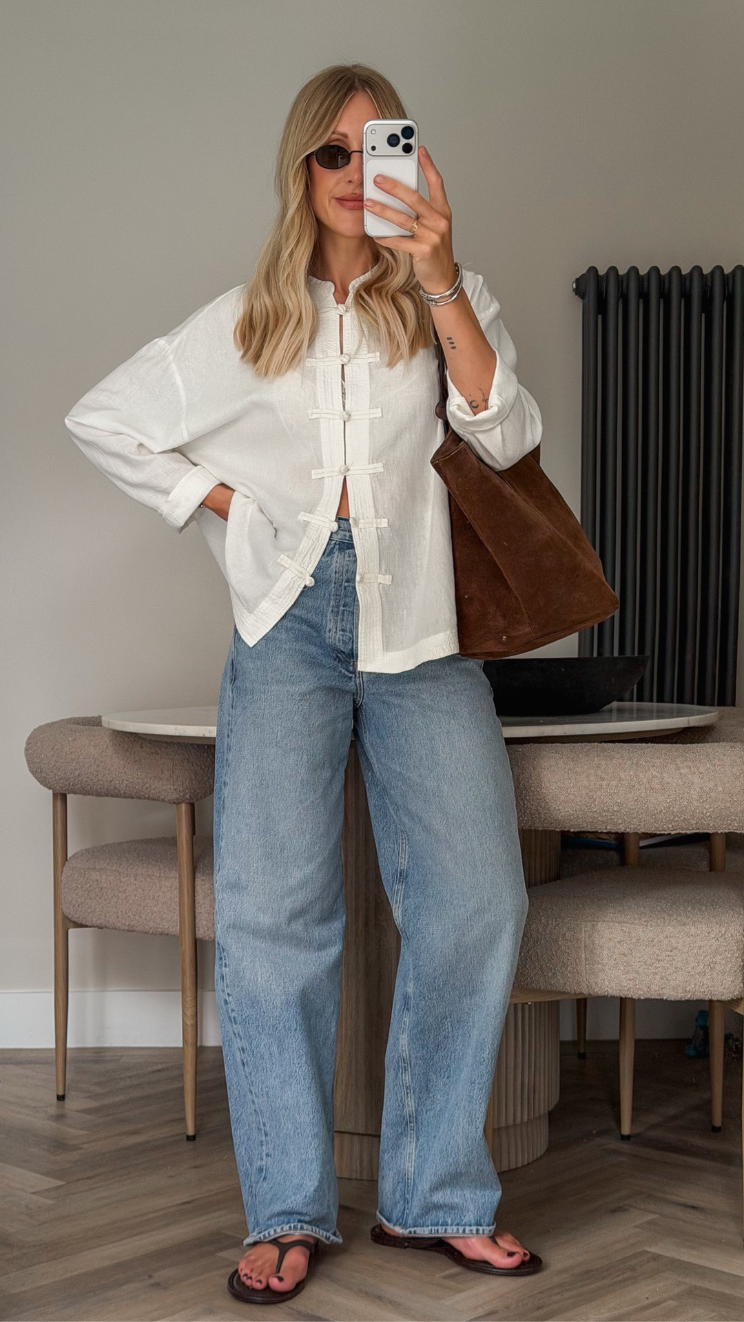 Styling my new Zara white linen shirt with my favourite denim jeans. 🐸🤍👖

Wearing the Zara frog fastening linen shirt in a size L for a more oversized fit, paired with Citizens of Humanity Ayla jeans in a size 26. I’d recommend sizing down in the jeans if you prefer a more fitted waist, or stay true to size for the intended relaxed fit.

UK summer outfit • Zara new in • white linen shirt • summer jeans outfit • linen shirt styling • capsule wardrobe • everyday outfit ideas • effortless style • elevated basics • relaxed denim • minimalist style • outfit inspiration #zara #jeans #linen

#LTKuk #LTKsummer #LTKjeans