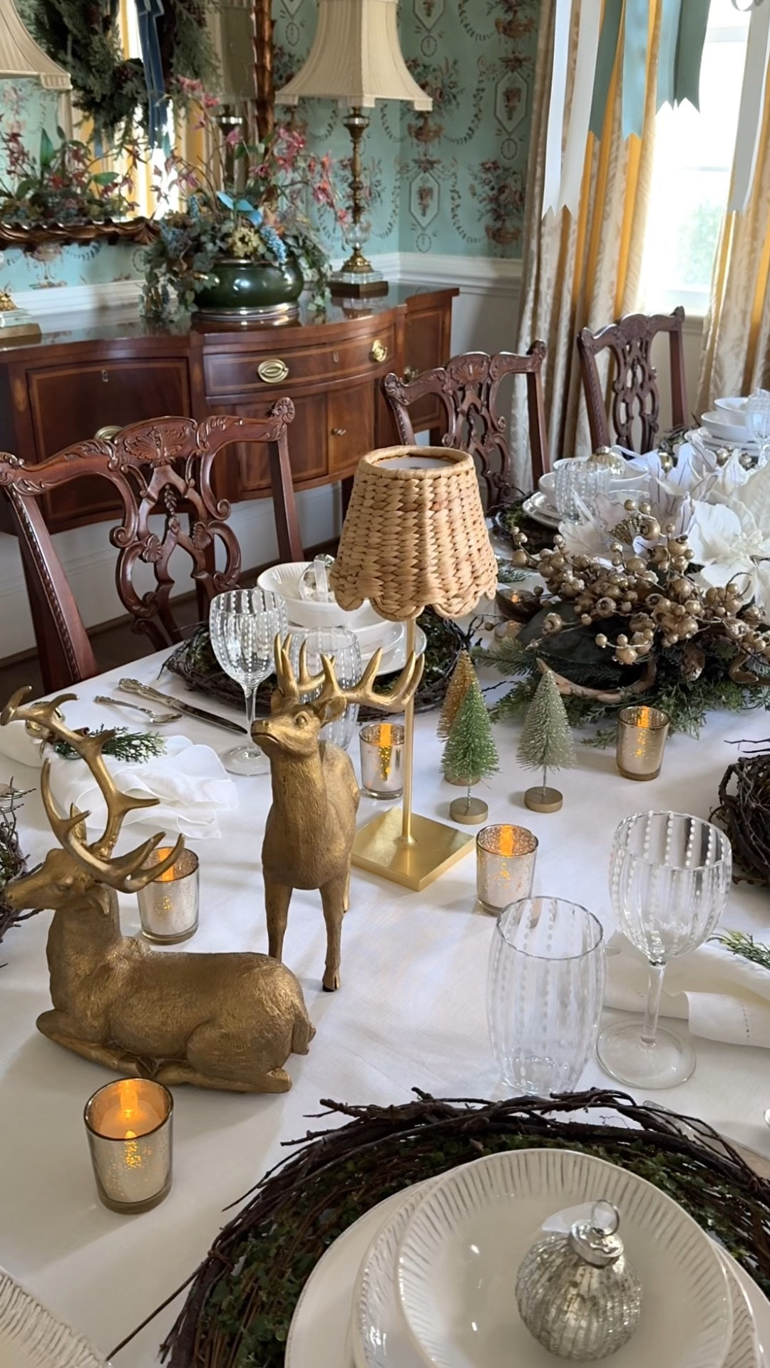 When setting a table, do you prefer a cozy elegant look or something more casual? Today, I’m featuring earthenware gifted from @zafferanoamerica. Let’s talk cozy elegance with a sprinkle of sparkle! ✨ This dreamy setup is giving artisan charm meets festive magic. The handmade Italian dinnerware (Graffito Collection) On top of grapevine chargers pairs perfectly with chic wine goblets and beverage glasses from the Perle Collection—and don’t even get me started on the adorable Poldino Pro Lamps with woven hyacinth shades. 🎄✨

For the centerpiece, I went all out with frosted pinecones, white poinsettias, glittery gold berry stems, and a touch of greenery. Add in reindeer, mercury glass candle holders, and bottle brush trees, and voilà—holiday magic at its finest! Oh, and the mercury glass ornament at each place setting? A sweet little take-home gift because we’re extra like that. 🎄✨

So, what’s stealing your heart—artisan dinnerware, sparkling greenery, or those charming little details? Let me know in the comments! 🎄✨

#LTKHoliday #LTKHome #LTKSeasonal