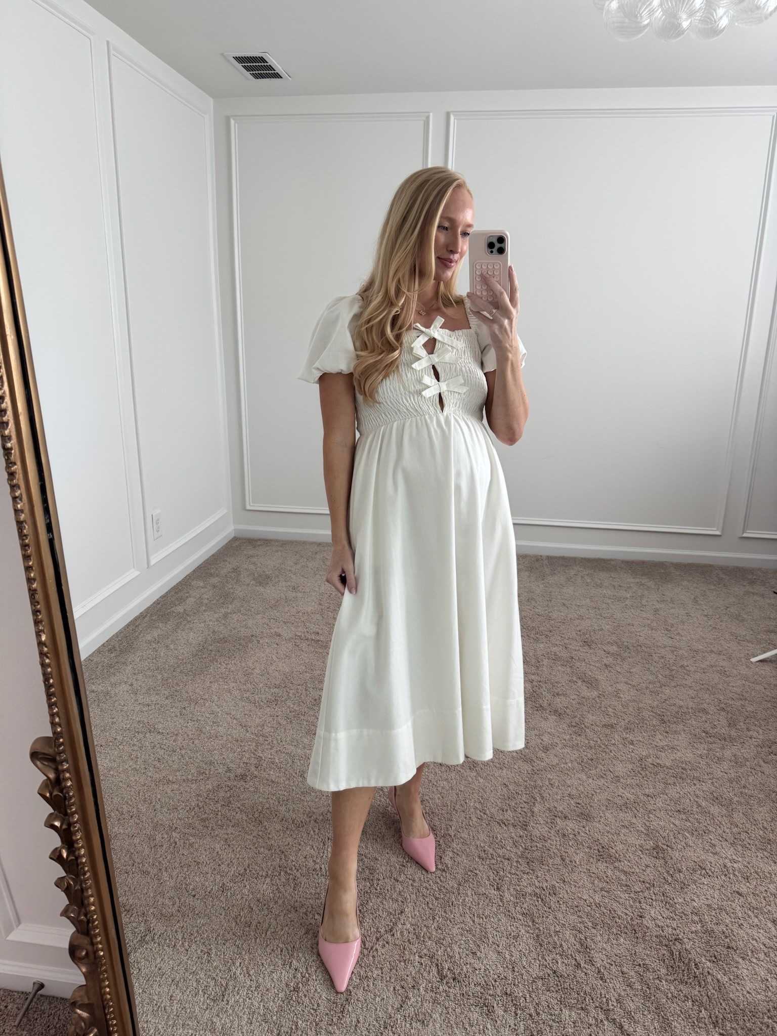 This midi dress is so cute with the bows!! And the quality is so good. The skirt is lined and thick. It is bump and nursing friendly with the smocking. I’m wearing a medium. Summer dresses // white dresses // midi dresses // bump friendly dresses 

#LTKSeasonal #LTKSummerEdit #LTKBump