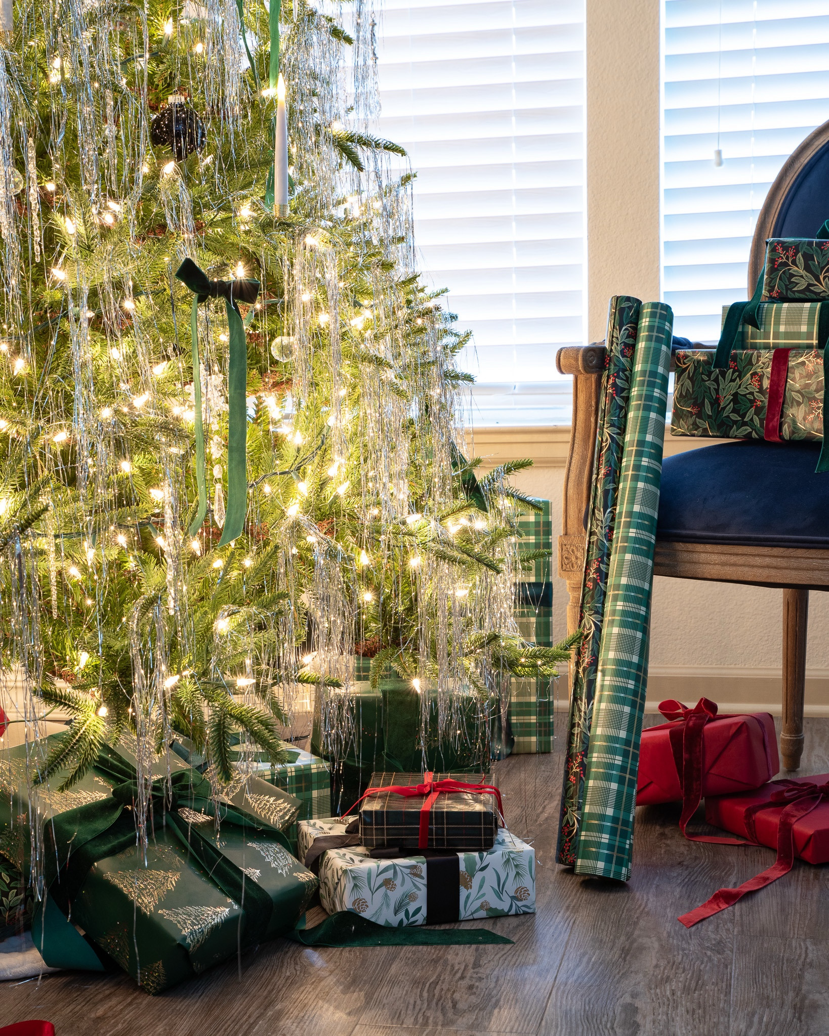 Bring a touch of classic glamour to your holiday decor with our favorite wrapping paper, velvet ribbon, and ornaments. We love this timeless look with tinsel, icicles, and candle-lit elegance. ✨ Get this look by shopping our LTK! Decor

#LTKHoliday #LTKSeasonal #LTKHome