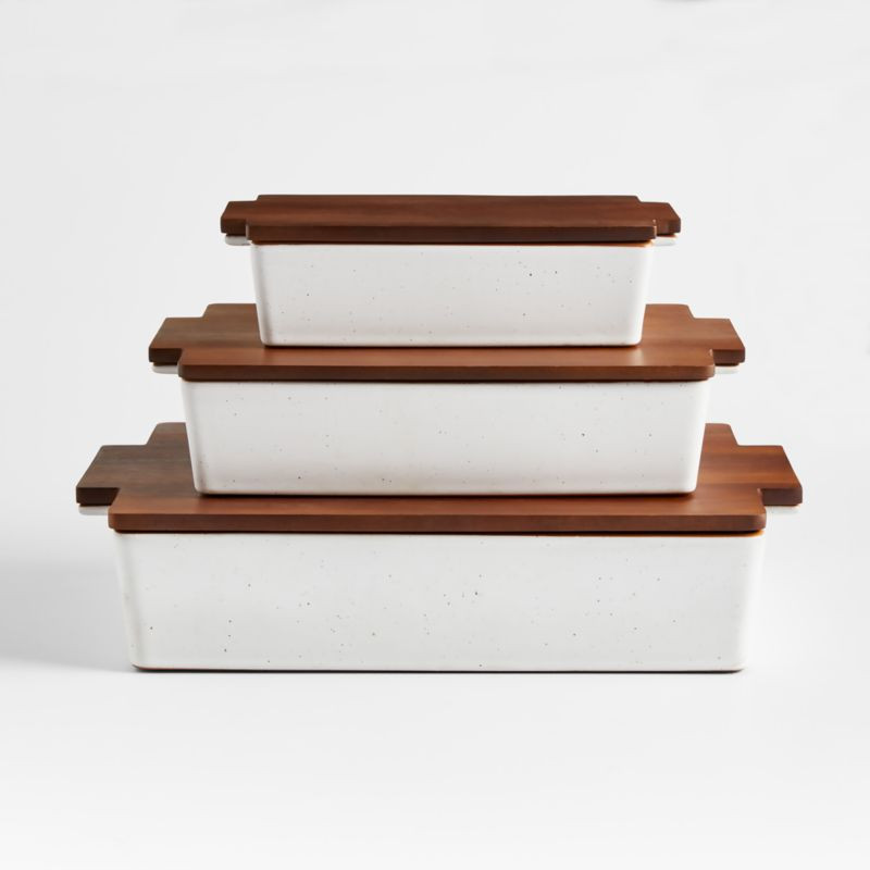 Asta 3-Piece Speckled Ceramic Baking Dish Set with Wooden Lids | Crate & Barrel | Crate & Barrel