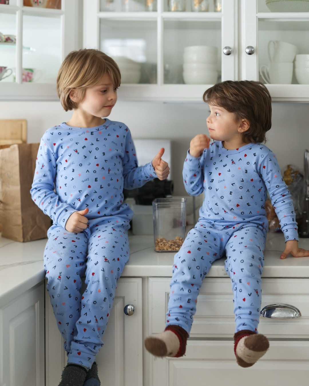 Sundays are for slow mornings in our jammies ☕️🥞 the boys are matching in the organic cotton blue love print pajamas from gap. On sale now 😍 

#brothers #matchingpajamas

#LTKFamily #LTKSaleAlert #LTKKids
