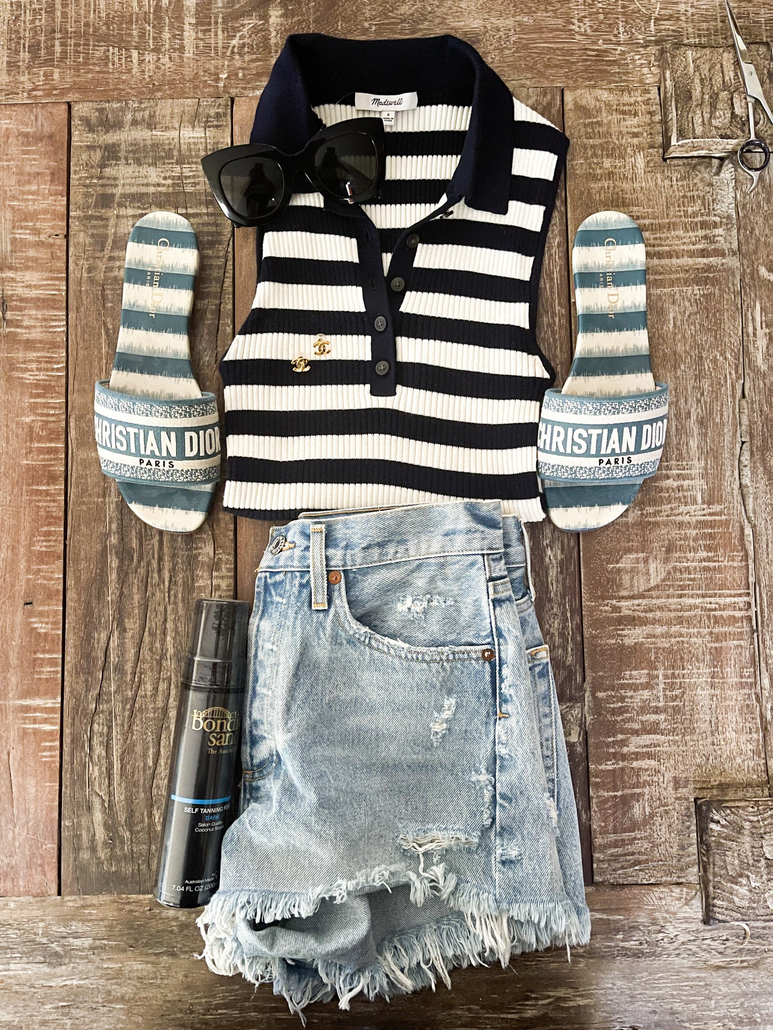 Madewell Memorial Day Sale! Love this striped sleeveless polo shirt, which can be dressed up or down! Looks great with denim shorts, skirts, wide leg pants, linen pants, denim jeans and more! Will also be perfect for a round of golf. Agolde denim shorts. Christian Dior Dway slide sandals. Best faux tanning mousse. Amazon tanning. Amazon finds. Nordstrom finds for her. Nordstrom fashion. Chanel earrings. Parker denim shorts. ❤️

#LTKFind #LTKstyletip #LTKsalealert