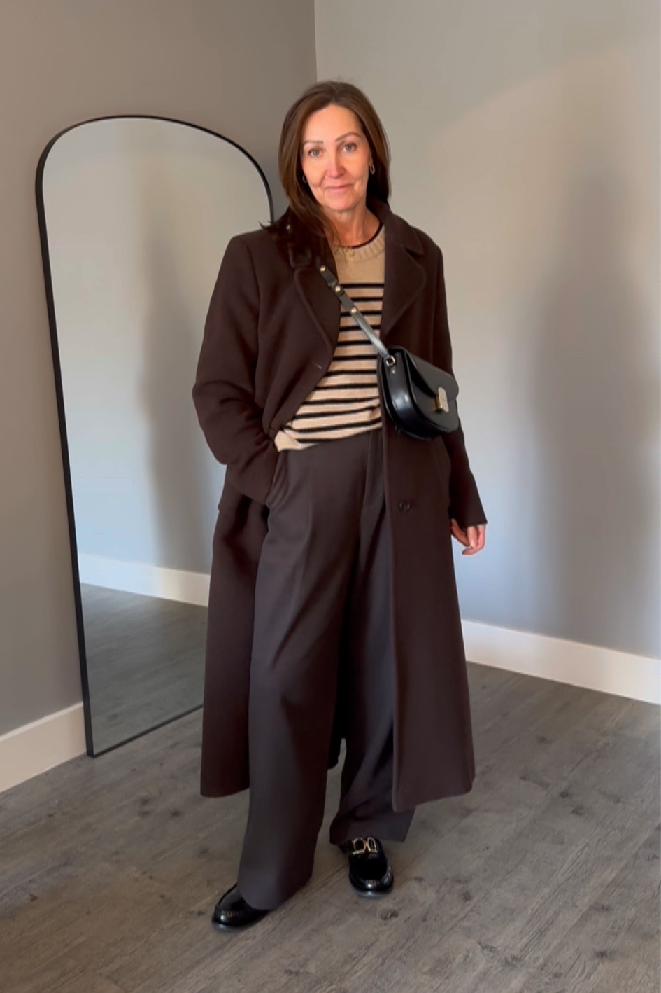 Lovely warm brown tones for a cold day. A brown wool maxi coat, cashmere striped jumper, the warmest trousers from Uniqlo, chunky loafers and my fave new bag from Sezane 

#LTKover40 #LTKeurope #LTKSeasonal