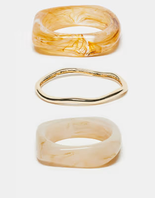 ASOS DESIGN pack of 3 bangles in mixed resin and gold tone | ASOS | ASOS (Global)