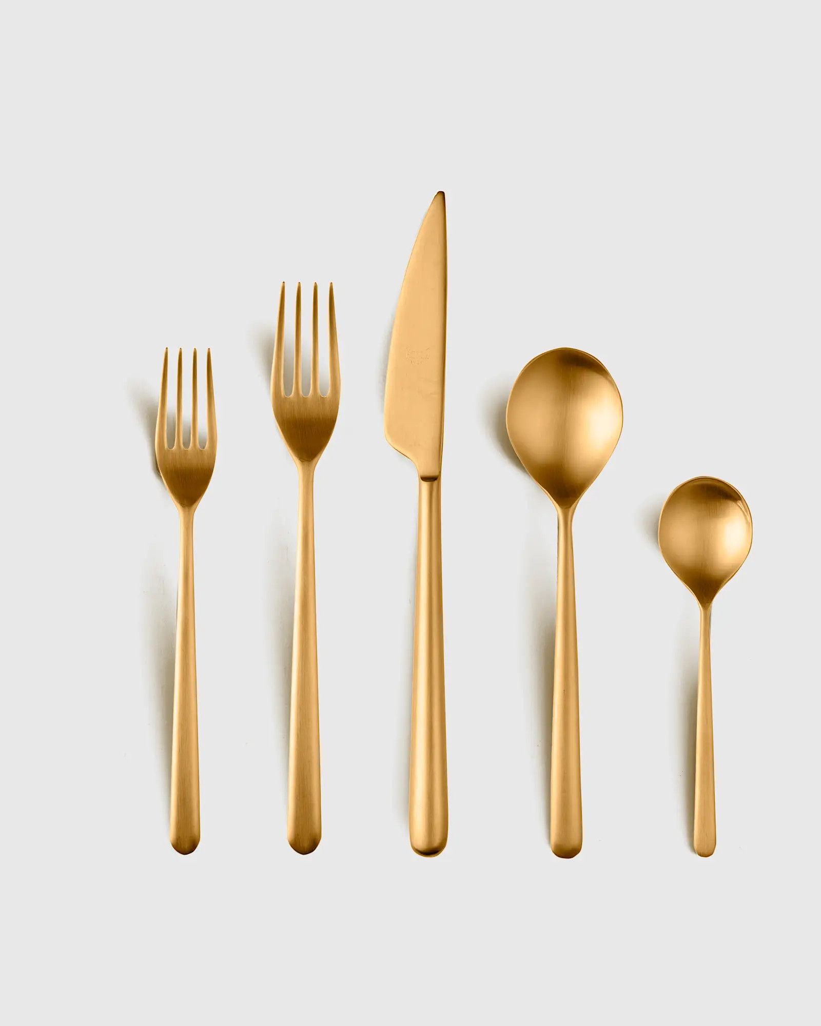 MEPRA Linea Flatware 20-Pc Set in Brushed Gold | Quince