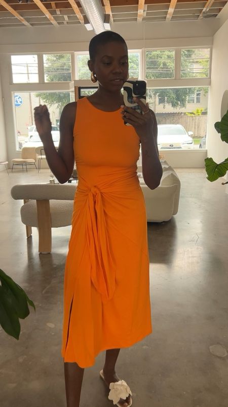 Spring dress! Orange side tie tank dress with ruching. The fabric is so nice and soft. I’m wearing an XS and it also comes in blue and black  

#LTKfindsunder50 #LTKworkwear #LTKfindsunder100