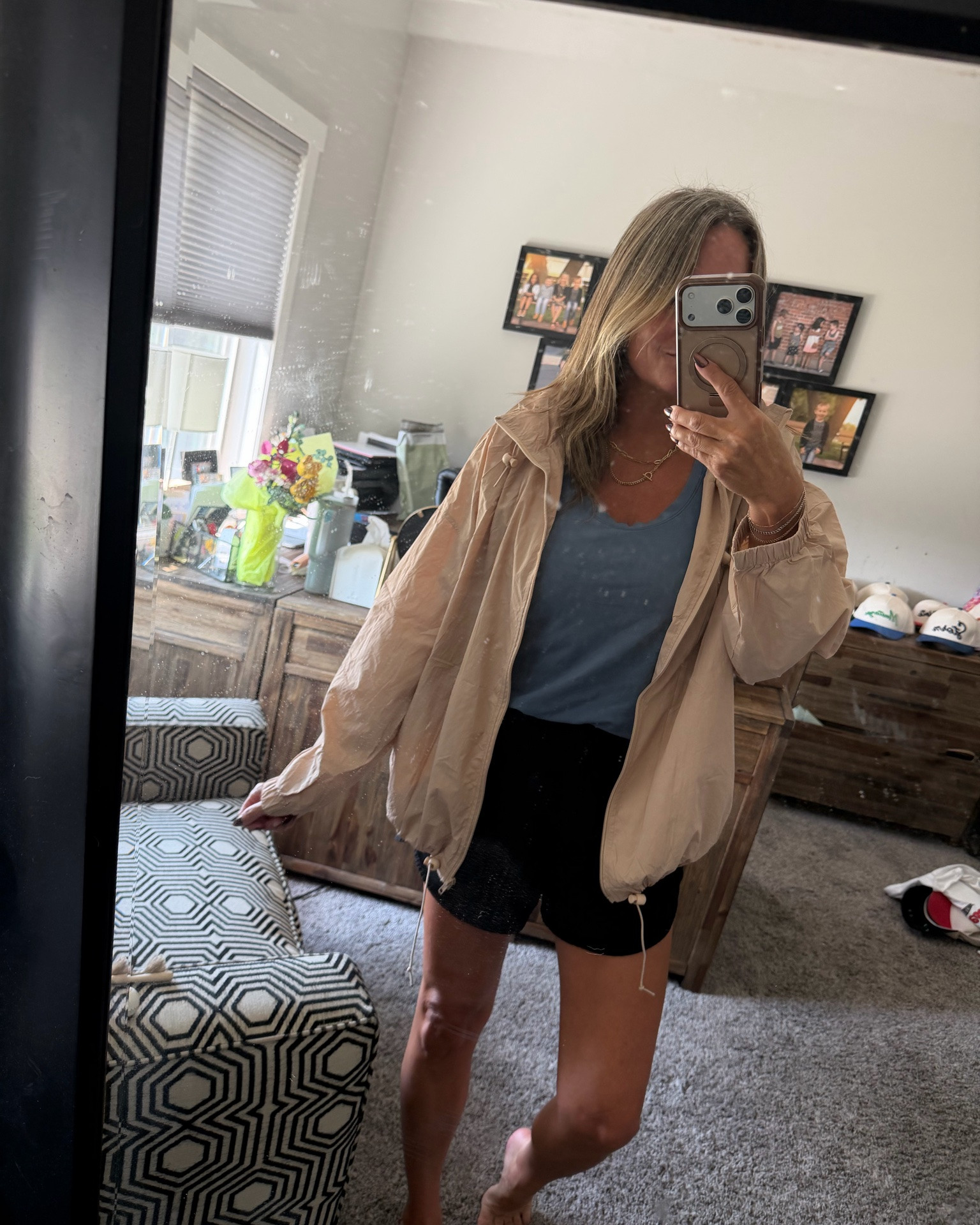 A great lightweight windbreaker with a hood that you can wear wide, or you can cinch and wear more bomber style.

I’m wearing a medium here, but I’m returning for a size small because I feel like this is a little too oversized. Tons of color options so good.

#LTKootd #LTKmomlife
