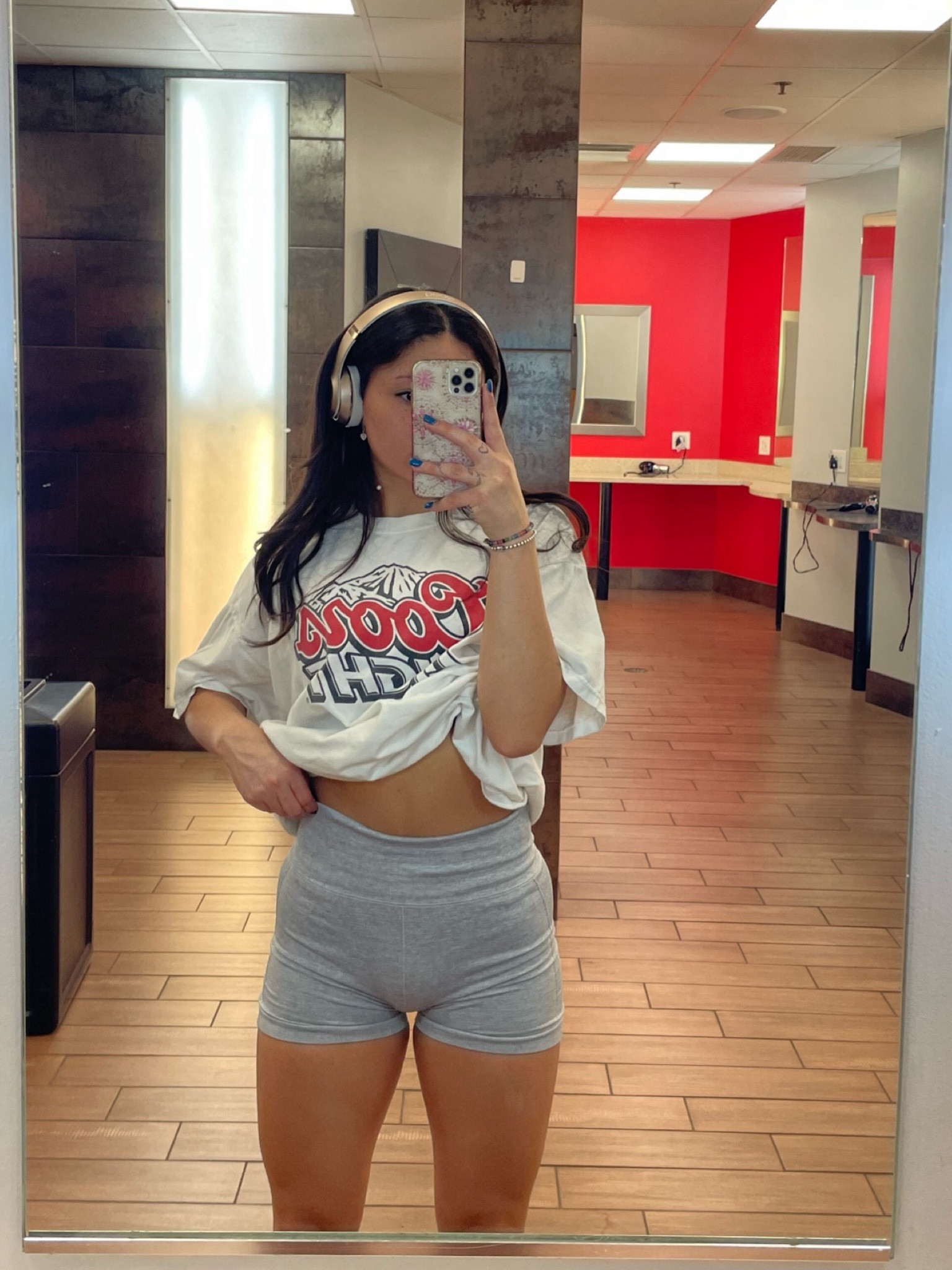 Thrifted baggy Coors Light Shirt. 
Forever 21 workout shorts. 
White converse with this outfit! 

#LTKFitness #LTKActive #LTKFindsUnder50