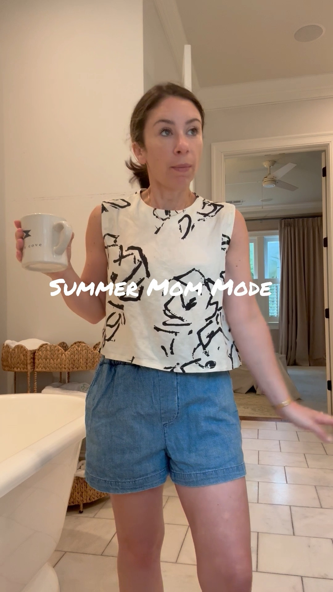 Easy outfit for a summer of momming in Madewell elastic waist shorts and Hunter Bell.