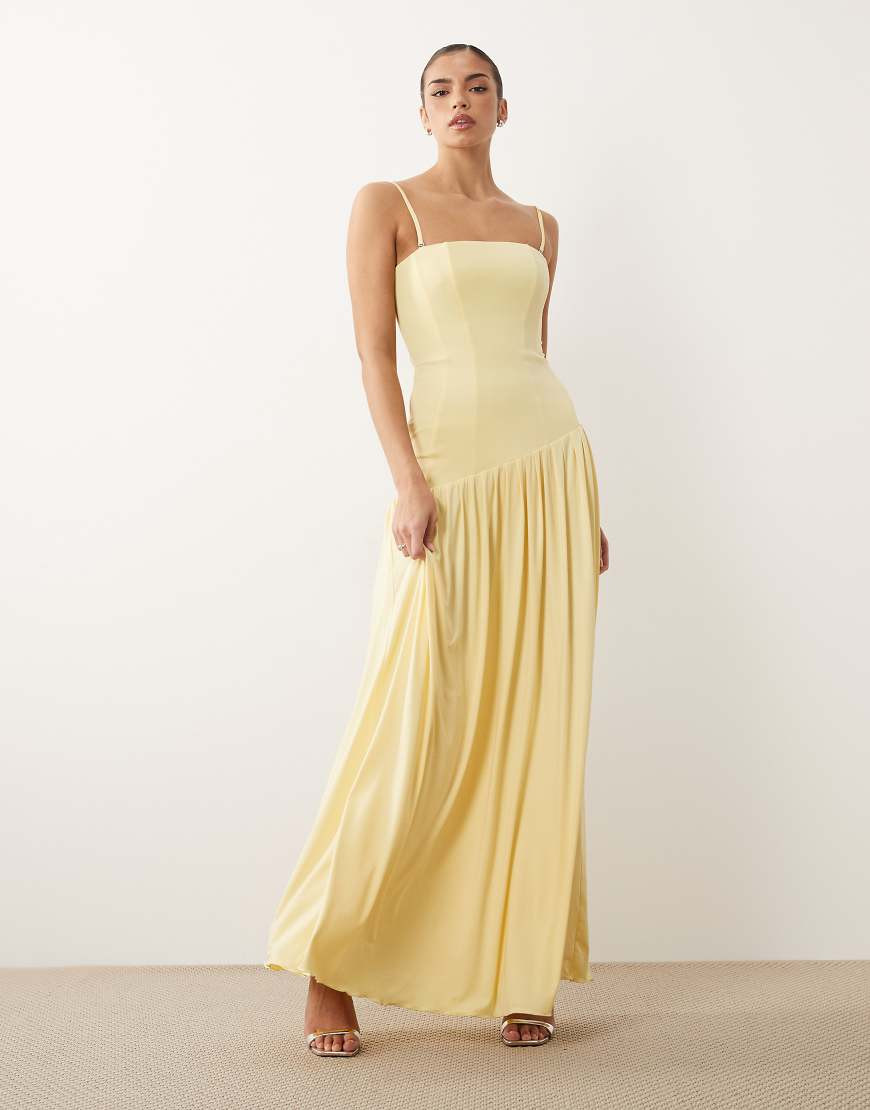 Oh Polly – Anschmiegsames Maxikleid in Buttergelb mit Korsett-Design und asymmetrischem Detail | ASOS (Global)