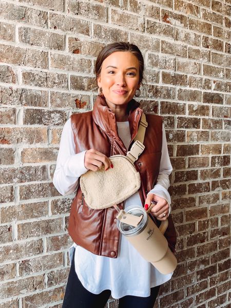 #OOTD November fall fashion fit 🍂🍁 outfit is complete with a neutral toned fleece crossbody & a matching stanley! This faux leather vest would be a great casual Thanksgiving day outfit idea. I paired it with a white long sleeve tunic from amazon! 

#newmomstyle #momstyle #postpartumfashion #postpartumoutfitideas #thanksgivingoutfitideas  

#LTKstyletip #LTKSeasonal #LTKfindsunder100