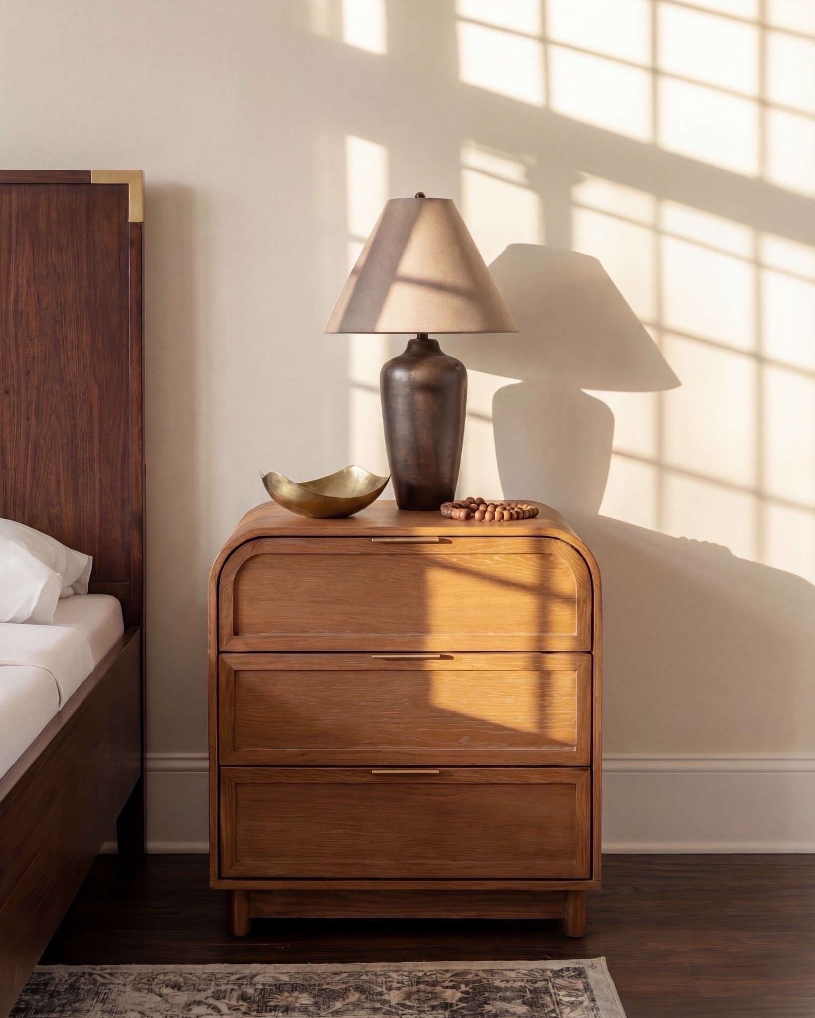 Bedroom Refresh : Shop The Look.
• Walnut + brass-detail bed frame
• Curved upholstered bench (soft neutral)
• Rust + cream accent pillows
• Chunky knit throw in warm ivory
• Oversized abstract wall art
• Wood nightstands with rounded edges
• Sculptural ceramic lamps
• Neutral vintage-style area rug
• Glass vase with dried florals

#LTKsale #LTKhome #LTKstyletip