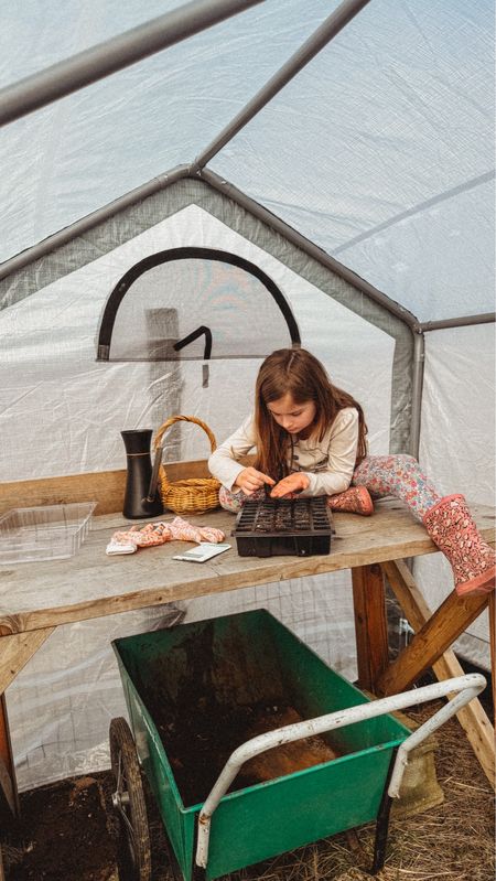 We added a new greenhouse to the garden and it’s served a dual purpose as a classroom! We homeschool, so my 7 year old spent the day with me planting seeds and getting ready for garden season this spring! 

#LTKSeasonal #LTKfindsunder50 #LTKkids