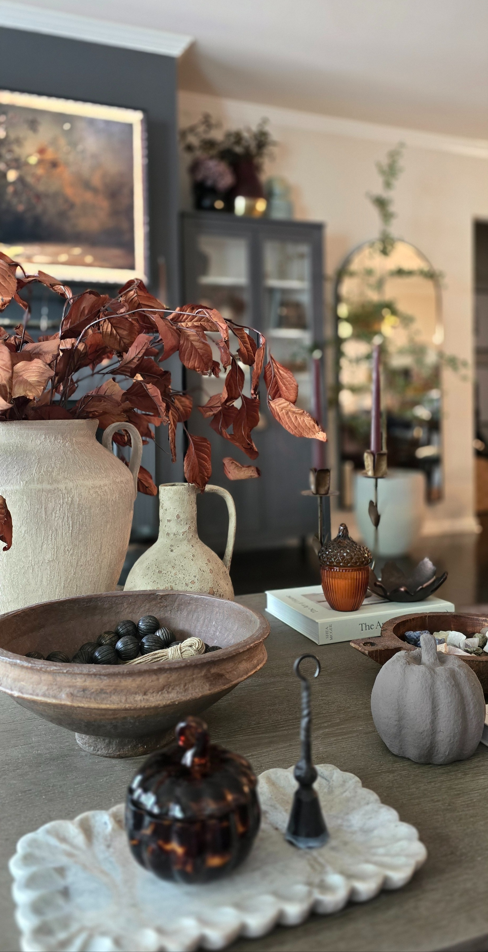 Fall coffee table styling. I changed the candles yet again. I found THE prettiest $5 taper candles in chocolate brown. A steal!  

 #LTKSeasonal #LTKHome