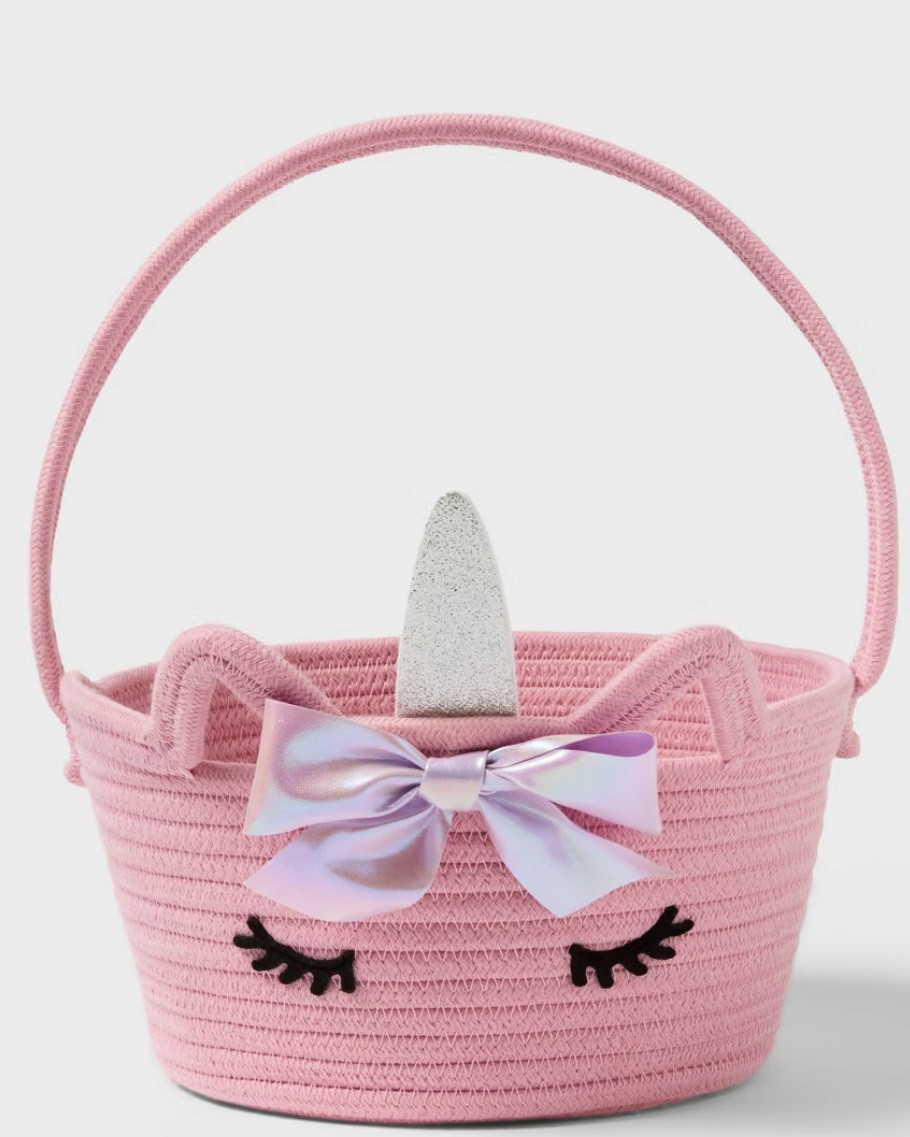 Charming unicorn rope basket for easter
Features a delightful pink hue
Crafted from soft plush construction
Includes handles for easy carrying
Perfect for storing and organizing items
Dimensions: 8 Inches (H) x 9.5 Inches (W) x 9.5 Inches (D)
Description
Add a touch of whimsy to your space with the Easter Unicorn Rope Basket Pink - Spritz™. Crafted from a soft plush construction, this charming pink basket is perfect for organizing your essentials. Its round shape and convenient handles make it easy to move around, while the delightful unicorn design adds a playful element to your Easter or spring decor. Ideal for universal placement, it measures 8 inches in height and 9.5 inches in both width and depth.

Spritz™: Pops of joy that make the moment™
@Target 

#LTKU #LTKSaleAlert #LTKFestival