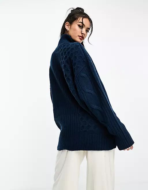 ASOS DESIGN longline cable sweater with high neck in navy | ASOS (Global)