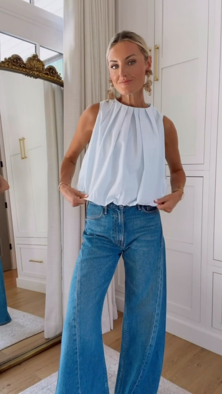 How pretty and chic is this soft blue top paired with these jeans? I love the pleating on the top and how you can style these pieces dressed up or down! Wearing XS top and 25 jeans

Loverly grey, wide leg denim, baby blue bubble hem top, mother denim, girls night outfit, date night outfit ideas

#LTKSeasonal #LTKootd