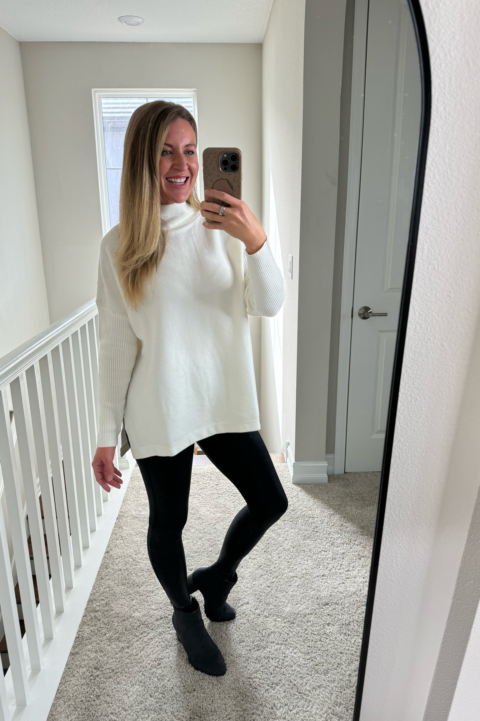 Winter wardrobe must have! This winter outfit is the perfect day or night look with a warm sweater that pairs well with leggings or jeans. Highly recommend this sweater as a must have winter sweater.

Wearing a size small in the sweat and Spanx faux leather leggings. 

Almost 5’6” and 130lbs

#LTKstyletip #LTKfindsunder100 #LTKSeasonal
