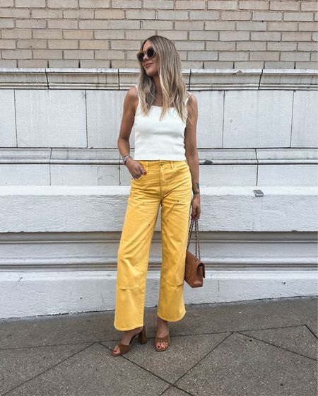 Fashion Jackson wearing ivory sweater tank (tts) yellow jeans (tts / I sized up for a relaxed fit) tan suede sandals #fashionjackson #shopbop #summeroutfits #nashvilleoutfits 



#LTKover40 #LTKstyletip