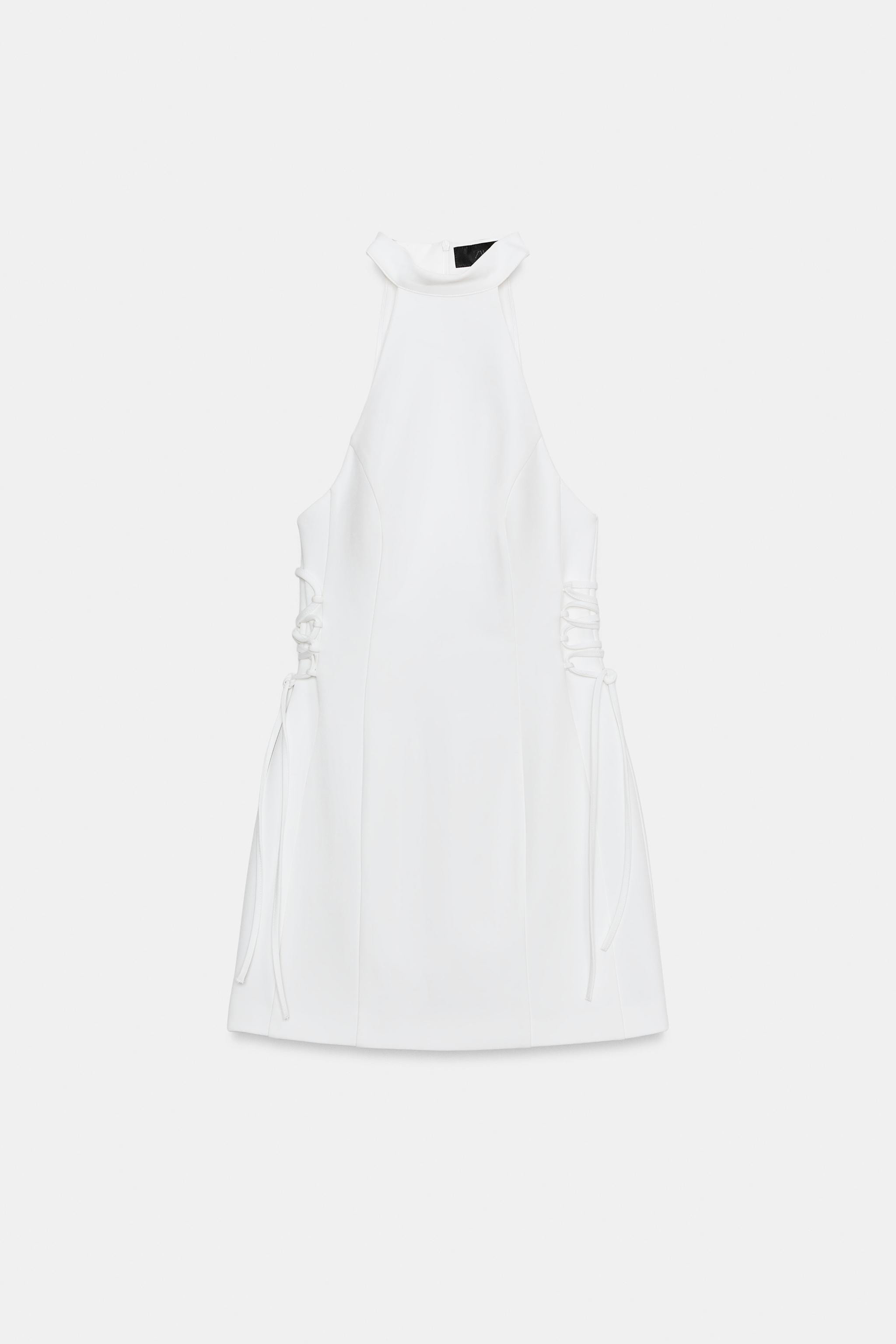 Model height: 181 cmShort halter neck, off-the-shoulder dress. Matching fabric side tie detail. L... | Zara US