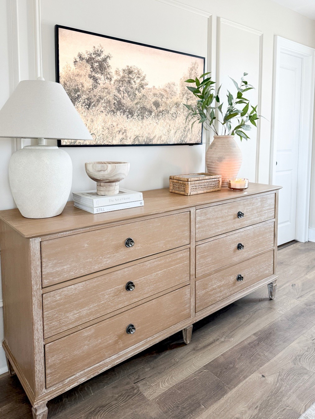 Dresser, wide dresser, dresser decor, home decor, table decor, shelf decor, faux greenery, large lamp, table lamp, large vase, frame tv, art tv

#LTKHome #LTKSaleAlert