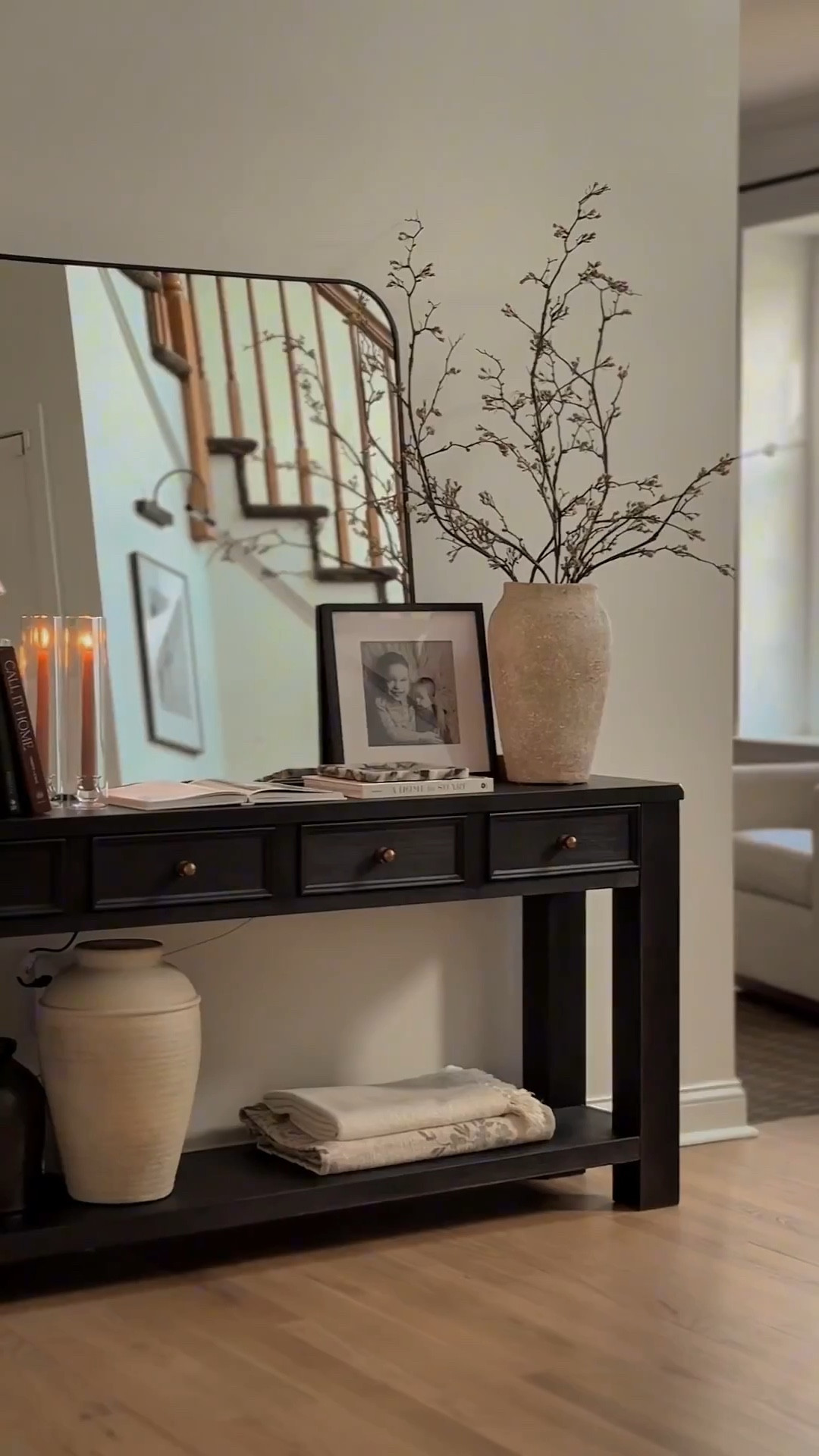 Entryway decor, entryway styling, entryway console table, console table decor, entryway mirror, spring decor, spring stems, table lamp, black console table

#LTKHome