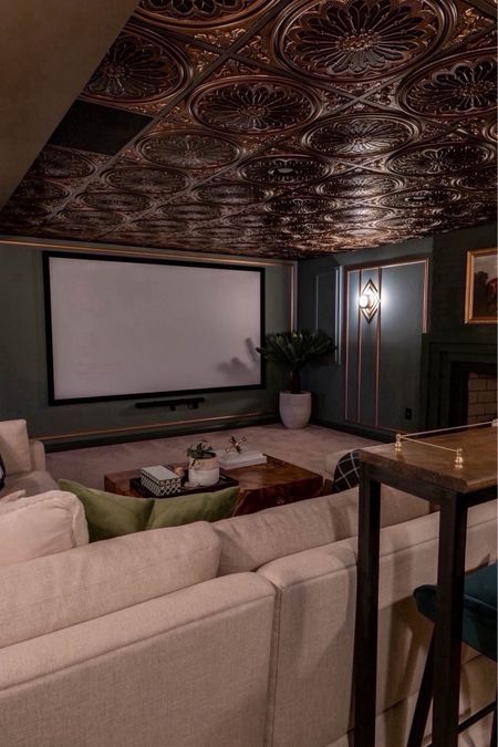 Shop everything in our moody basement with 1920’s art decor! So fun for the kids and family movie nights! 

Home theater, movie room, media room, basement remodel, art deco decor, home decor ideas, simple home decor, theater room 

#LTKhome #LTKfamily