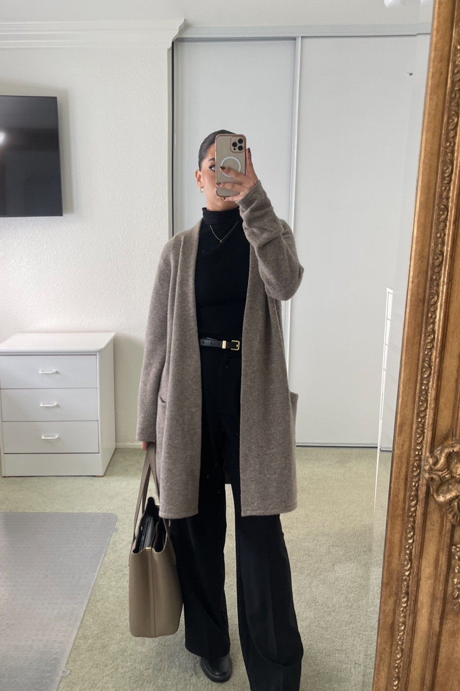 Love Jenni Kayne cardigans - especially ones with pockets! They’re 10/10 on the cozy scale. (I have 5 of these in all different colors.)

These boots get so many compliments and are super comfy! I have them in black and cognac.

A black turtleneck and a reliable pair of back slacks are staples in my wardrobe. I pull these out weekly!

#LTKStyleTip #LTKSaleAlert #LTKWorkwear